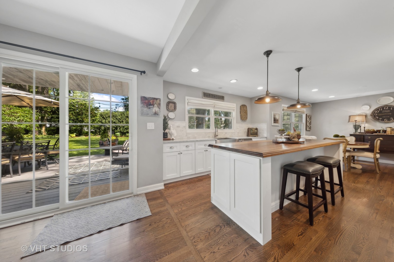 1305 Gamon Road Wheaton, IL 60189 - Photo 12 of 30 a kitchen with a table chairs refrigerator and microwave
