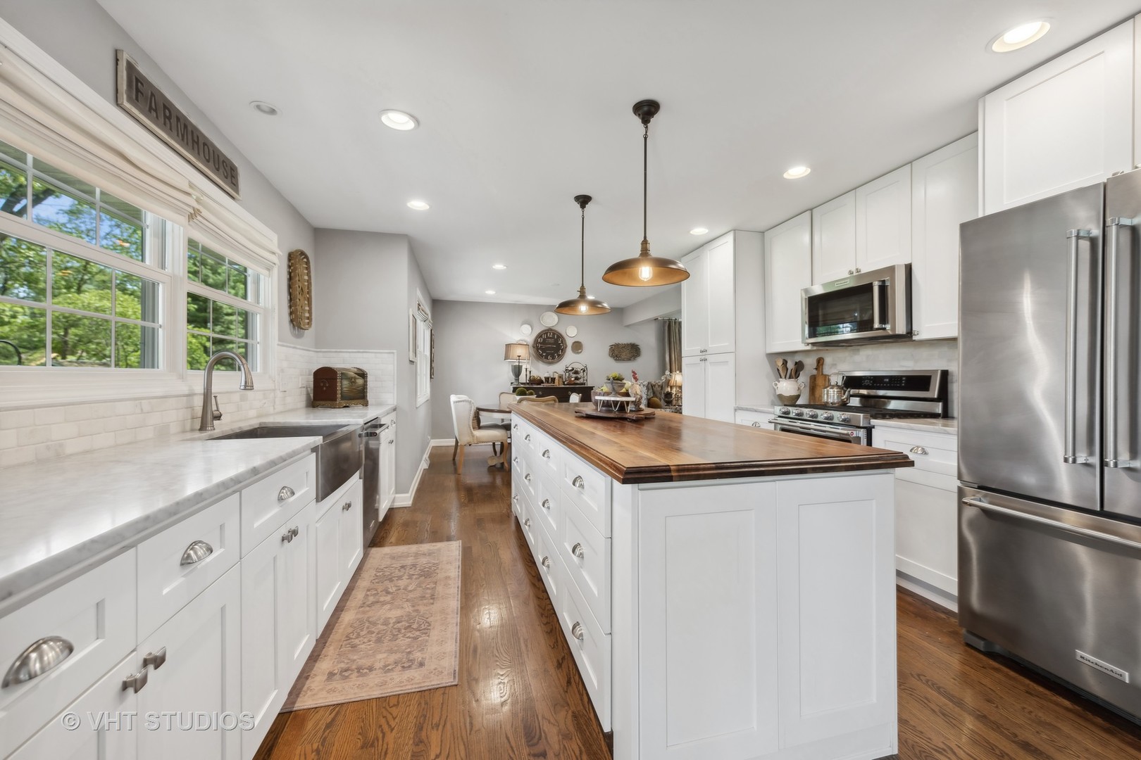 1305 Gamon Road Wheaton, IL 60189 - Photo 13 of 30 a kitchen with stainless steel appliances granite countertop a sink a stove a refrigerator and a wooden floor
