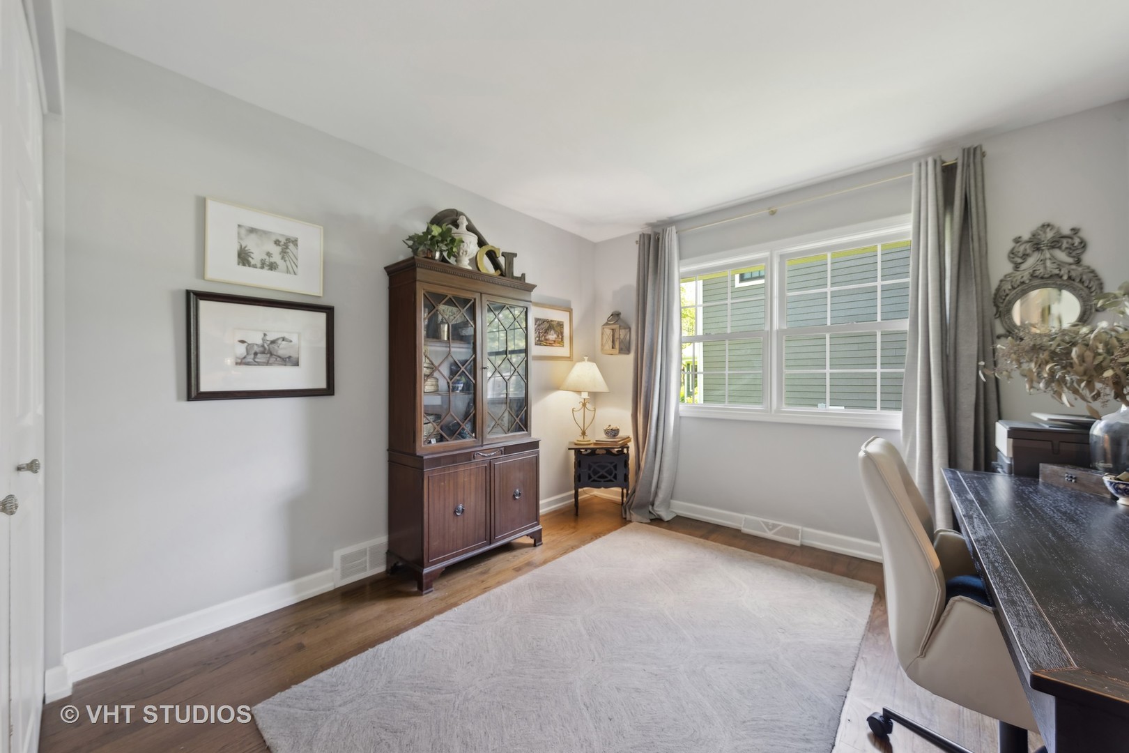 1305 Gamon Road Wheaton, IL 60189 - Photo 18 of 30 a view of a workspace with furniture and a window