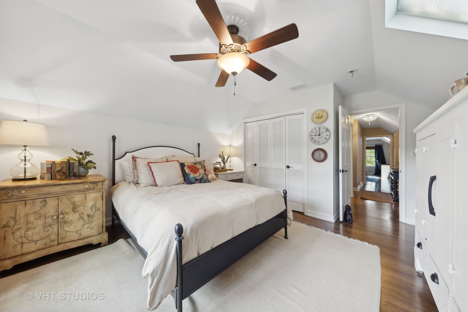 1305 Gamon Road Wheaton, IL 60189 - Photo 24 of 30 a bedroom with bed and a chandelier