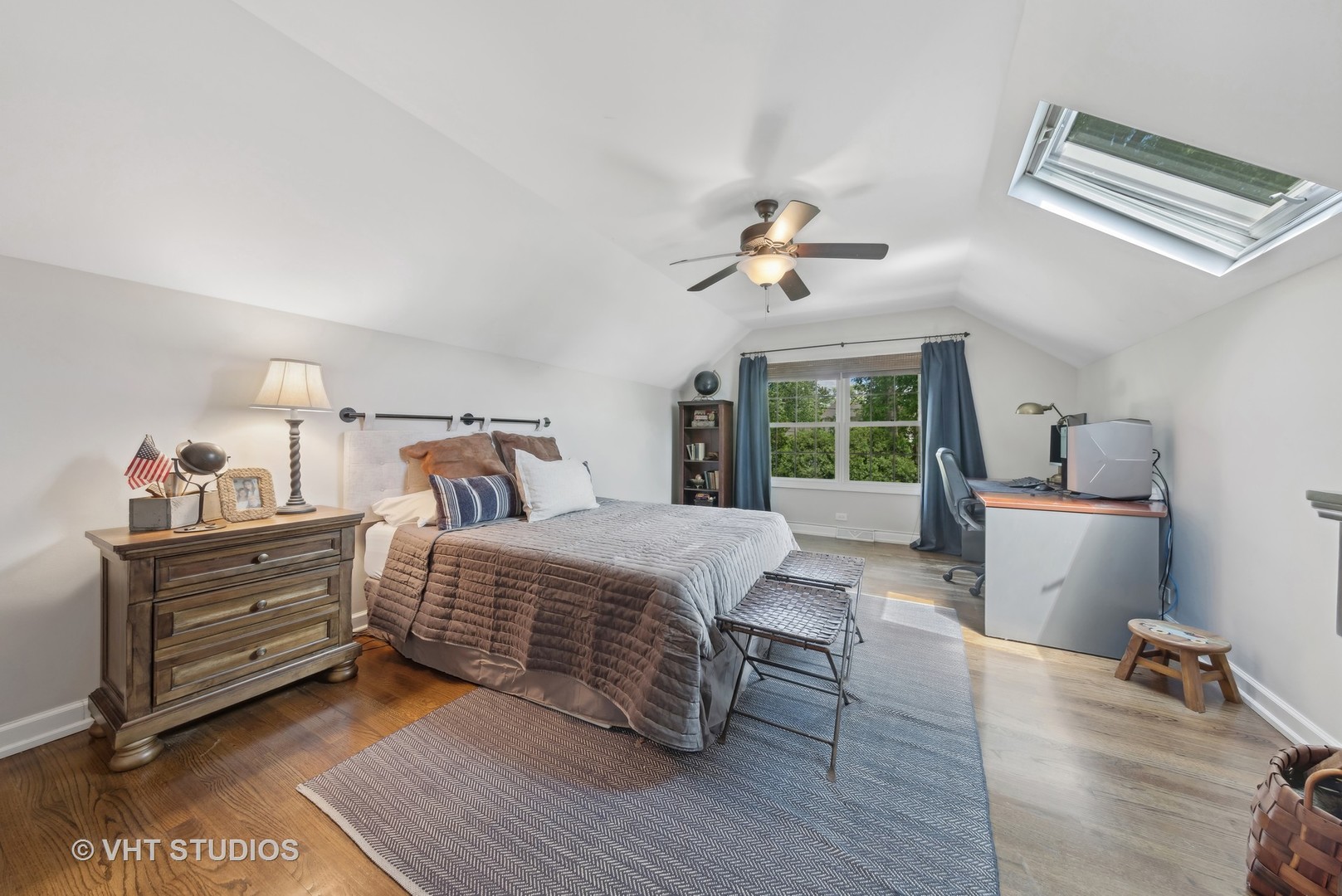 1305 Gamon Road Wheaton, IL 60189 - Photo 25 of 30 a bedroom with a bed and a chandelier