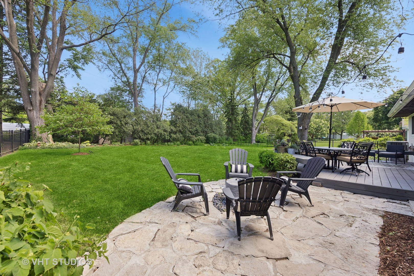 1305 Gamon Road Wheaton, IL 60189 - Photo 7 of 30 a view of a tables and chairs in a yard
