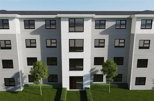 a view of an apartment with a garden