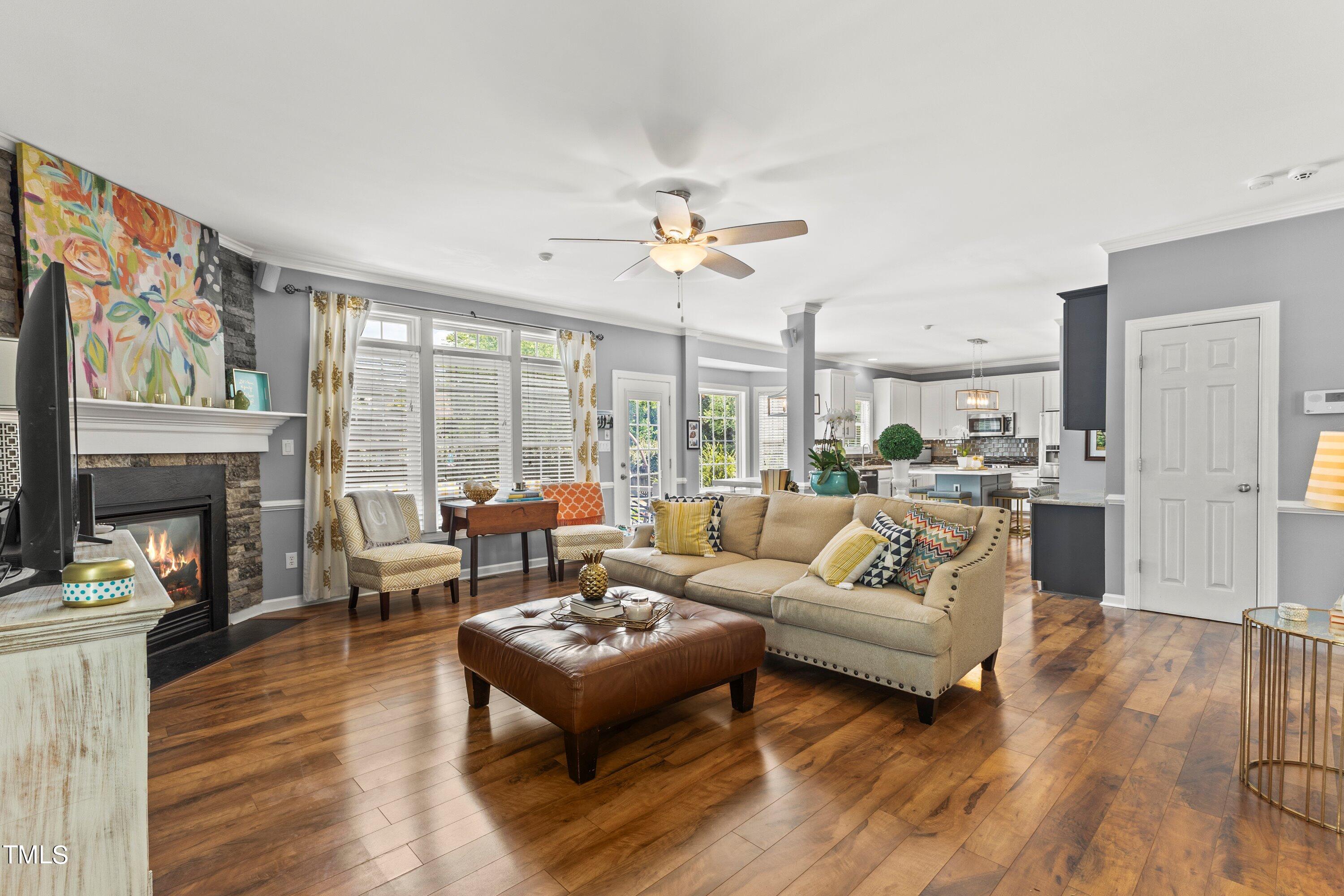 12212 Penrose Trail Raleigh, NC 27614 - Photo 13 of 41 a living room with fireplace furniture and a large window