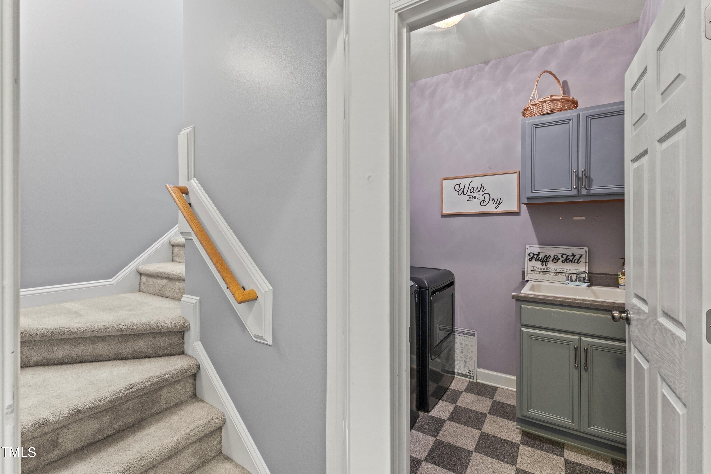 12212 Penrose Trail Raleigh, NC 27614 - Photo 22 of 41 a view of walk in closet with clothes and shoes