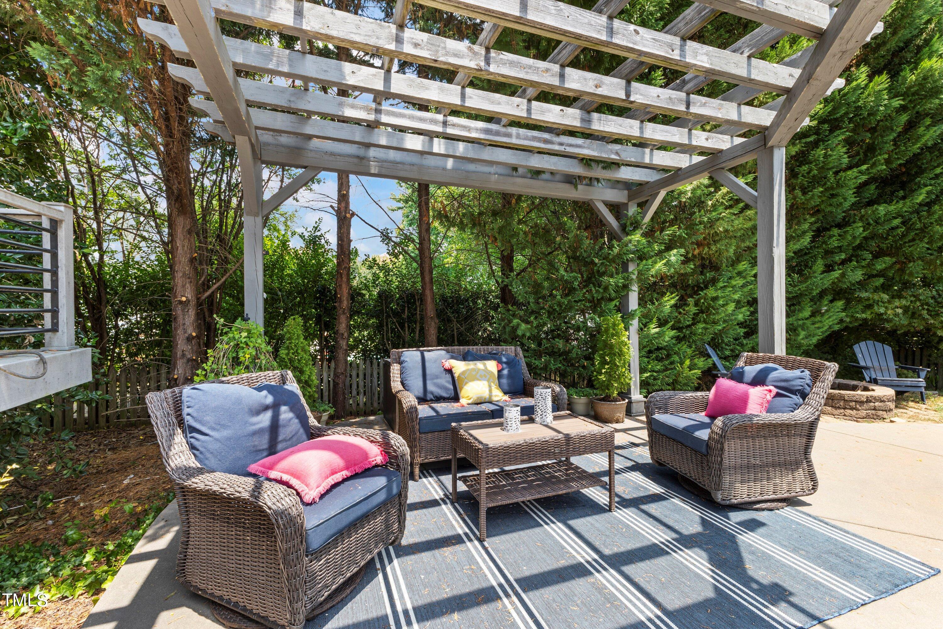 12212 Penrose Trail Raleigh, NC 27614 - Photo 33 of 41 a patio with patio couch and wooden floor