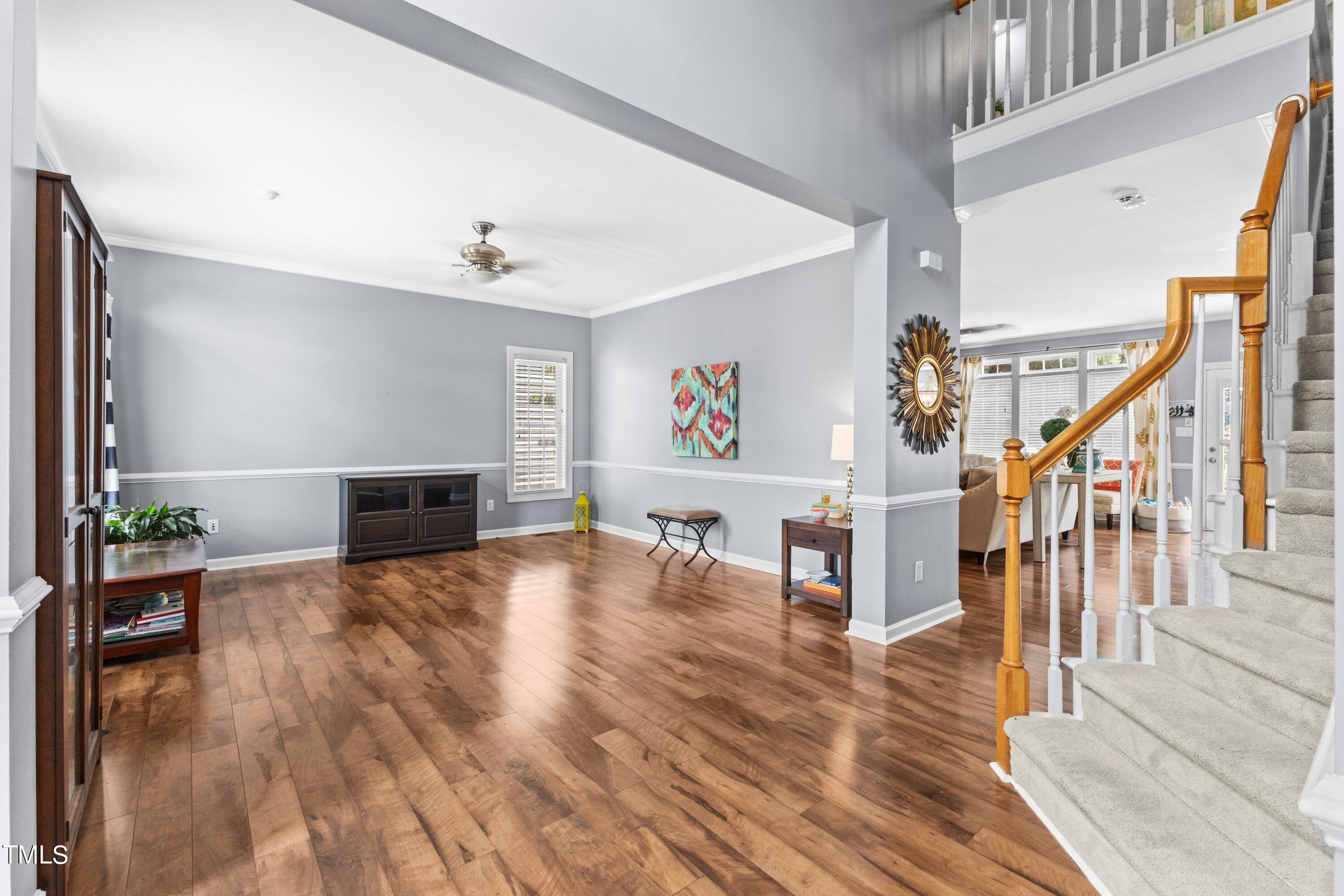 12212 Penrose Trail Raleigh, NC 27614 - Photo 7 of 41 a living room with fireplace furniture and a wooden floor