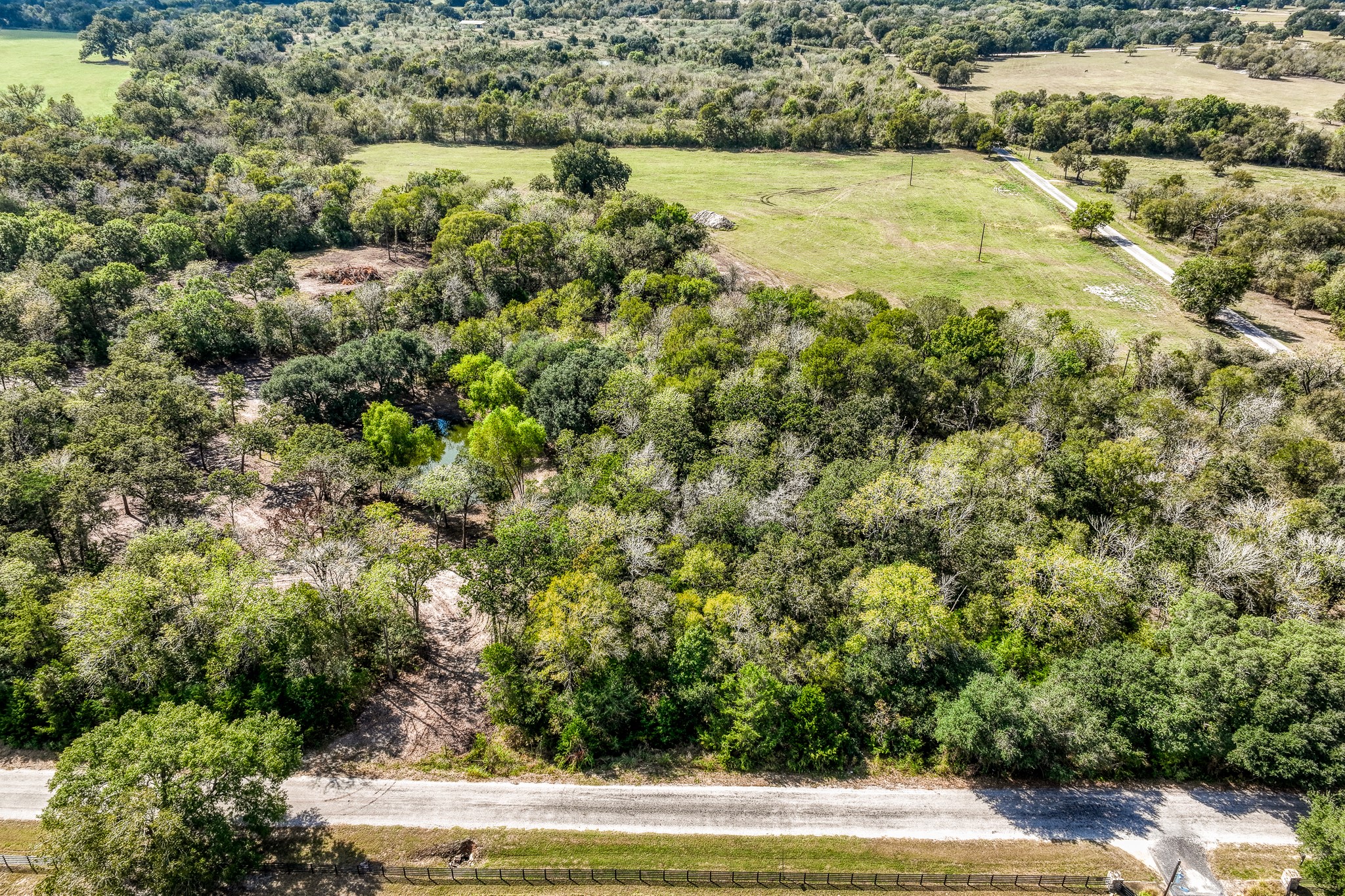 6 Sun Oil Road Brenham, TX 77833 - Photo 33 of 34 a view of a yard with an outdoor seating