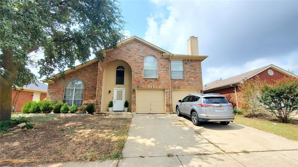 3612 Doolittle Drive Arlington, TX 76014 - Photo 1 of 1 a front view of a house with a yard