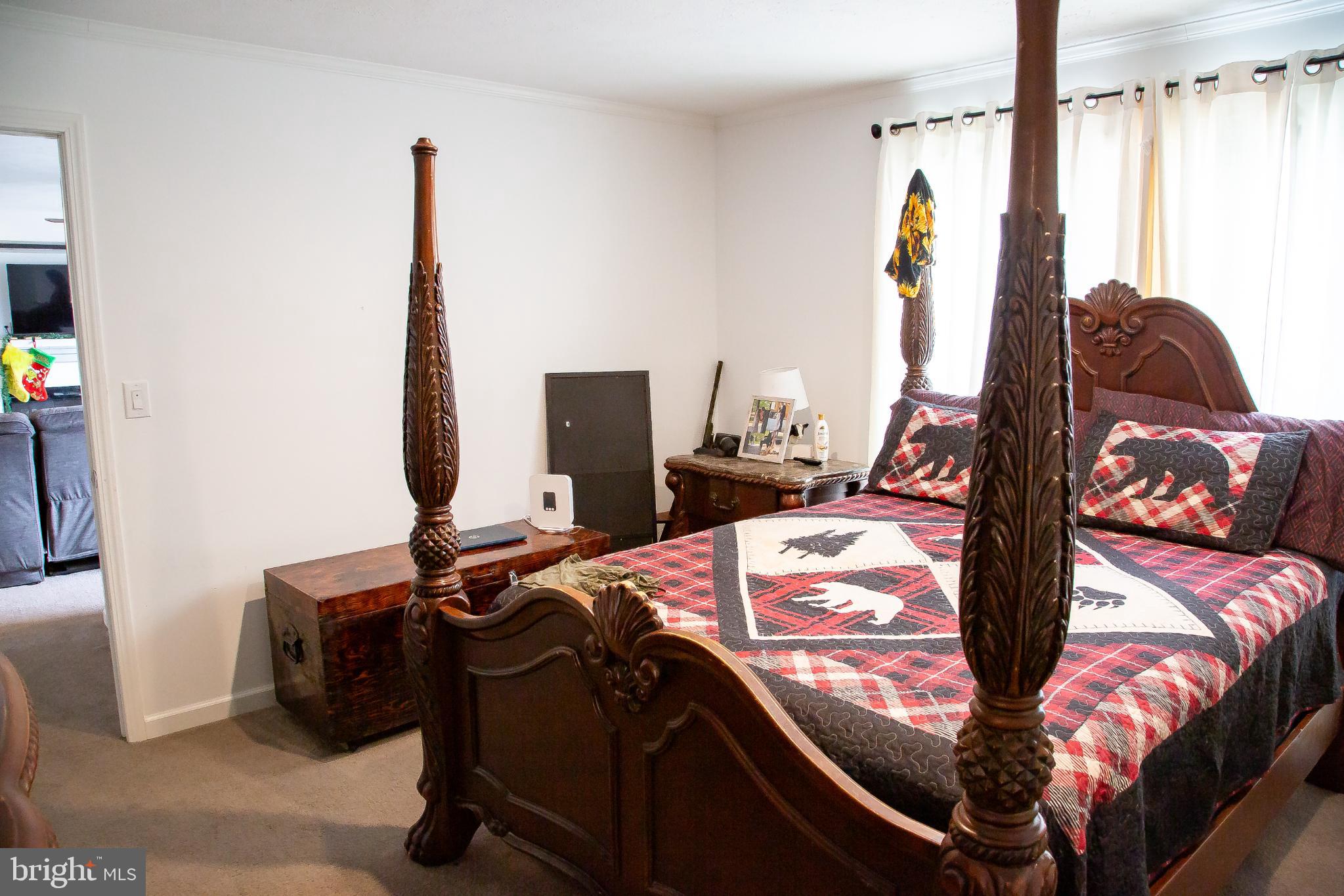 1101 Beaver Run Road Burlington, WV 26710 - Photo 11 of 40 a bedroom with a bed and a window