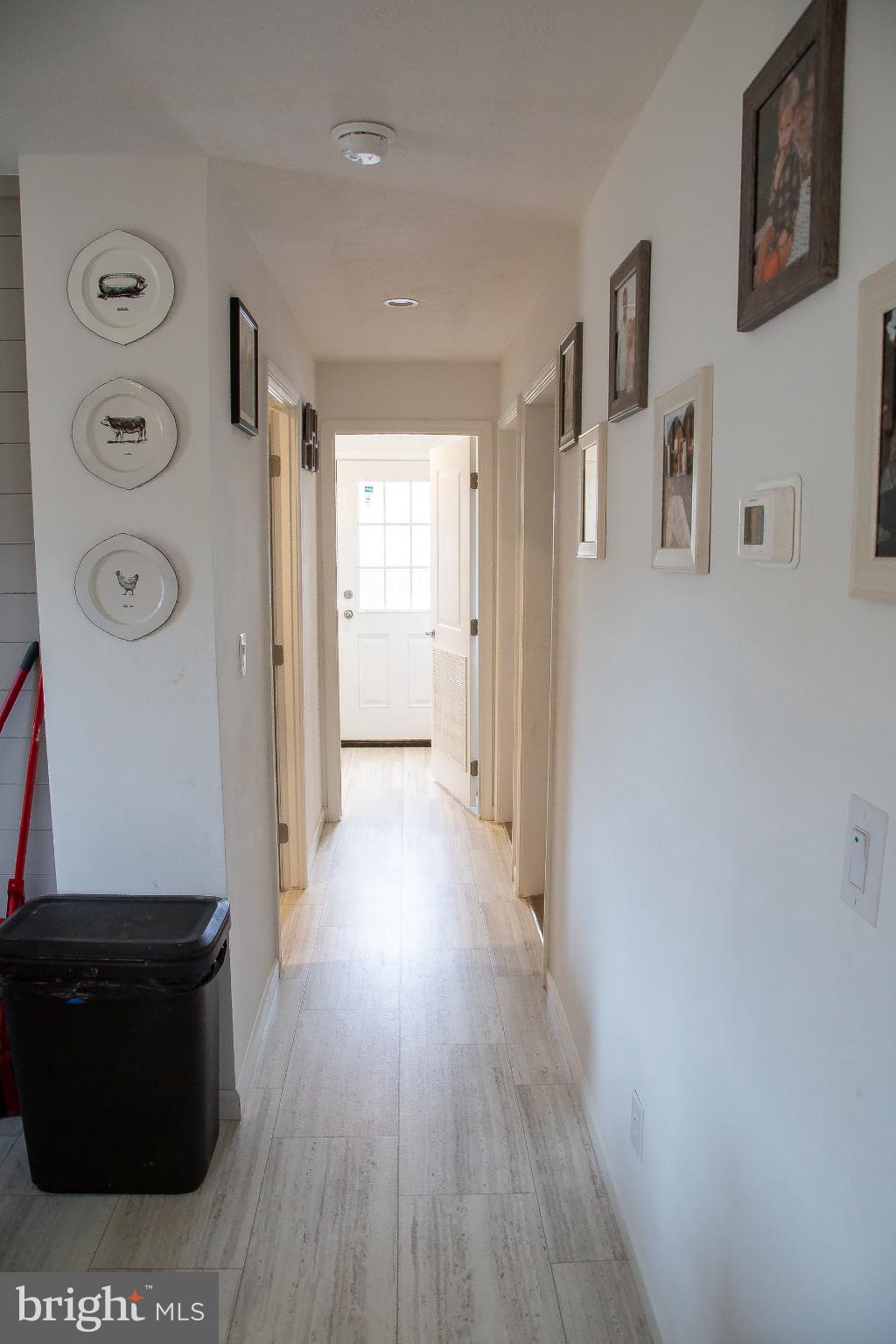 1101 Beaver Run Road Burlington, WV 26710 - Photo 16 of 40 a view of a hallway with wooden floor and cabinet