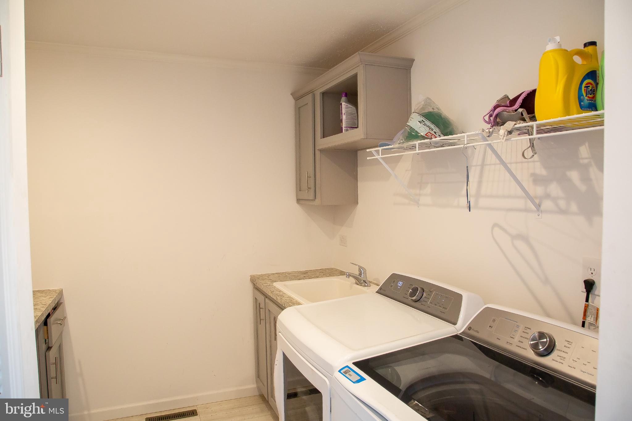 1101 Beaver Run Road Burlington, WV 26710 - Photo 22 of 40 a utility room with dryer and washer