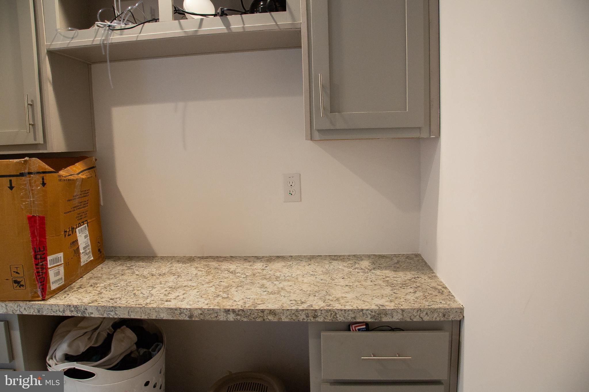 1101 Beaver Run Road Burlington, WV 26710 - Photo 25 of 40 a utility room with granite countertop cabinets and utility room