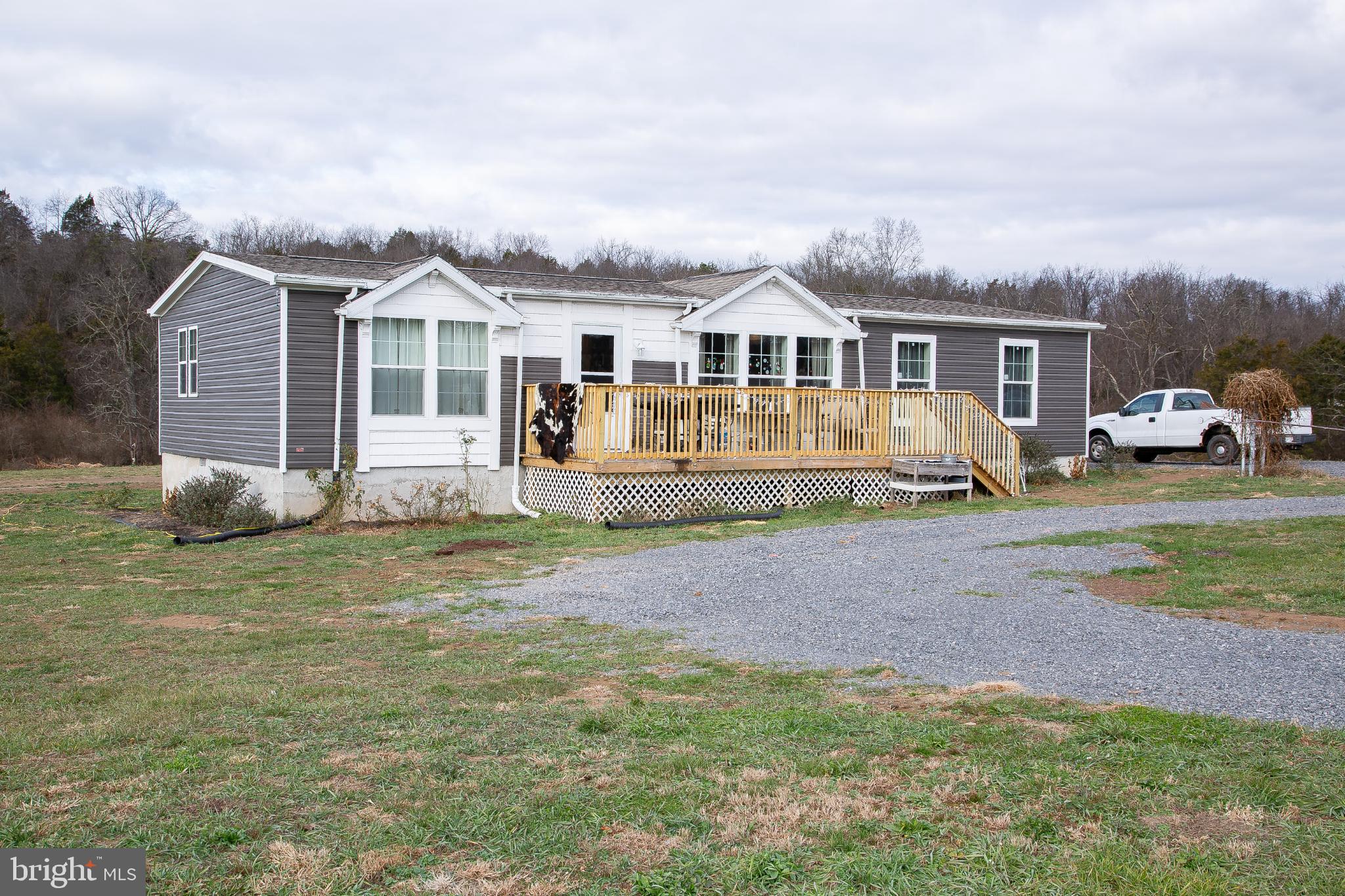 1101 Beaver Run Road Burlington, WV 26710 - Photo 29 of 40 a front view of a house with a garden