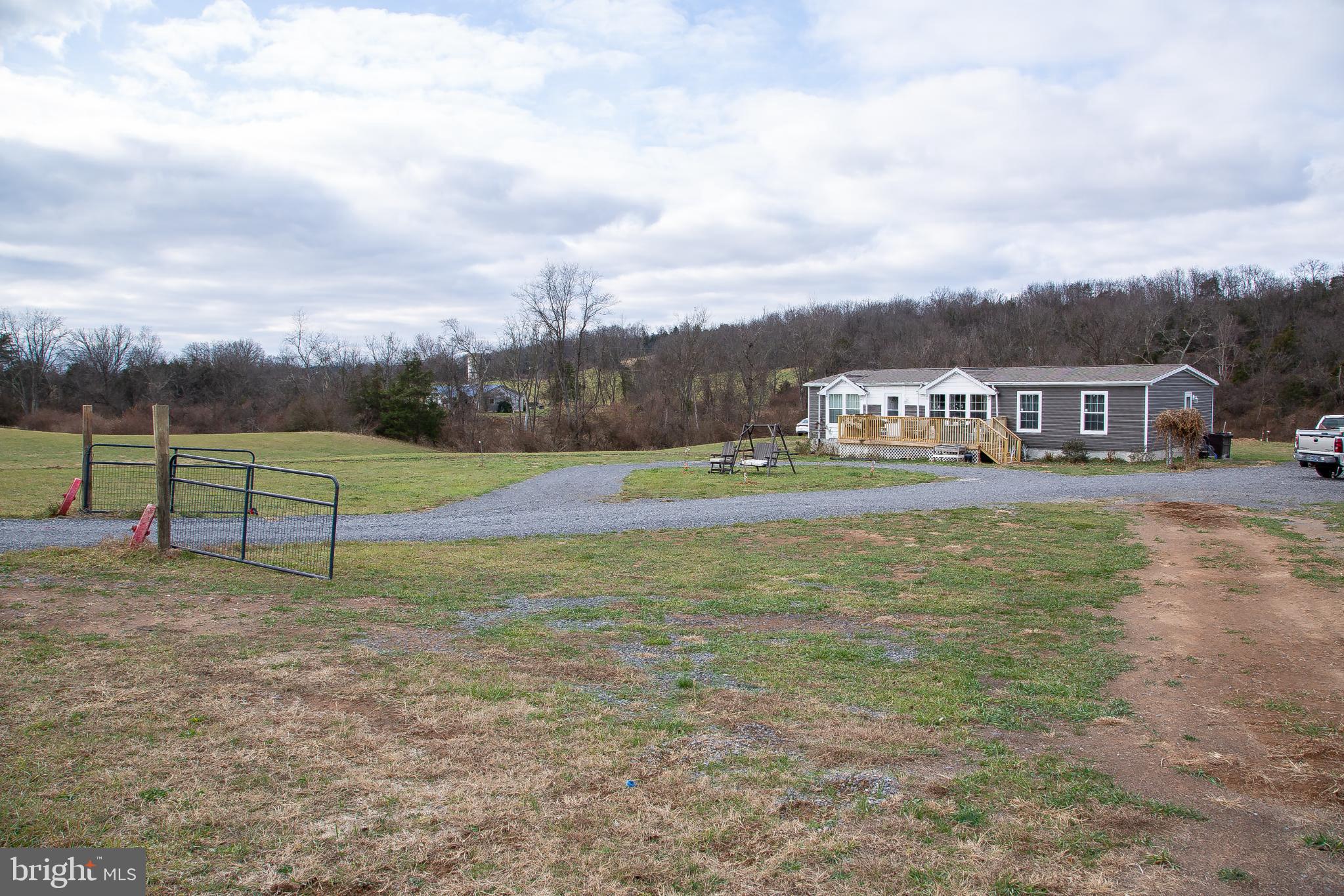 1101 Beaver Run Road Burlington, WV 26710 - Photo 35 of 40 a view of swimming pool with a yard and fence
