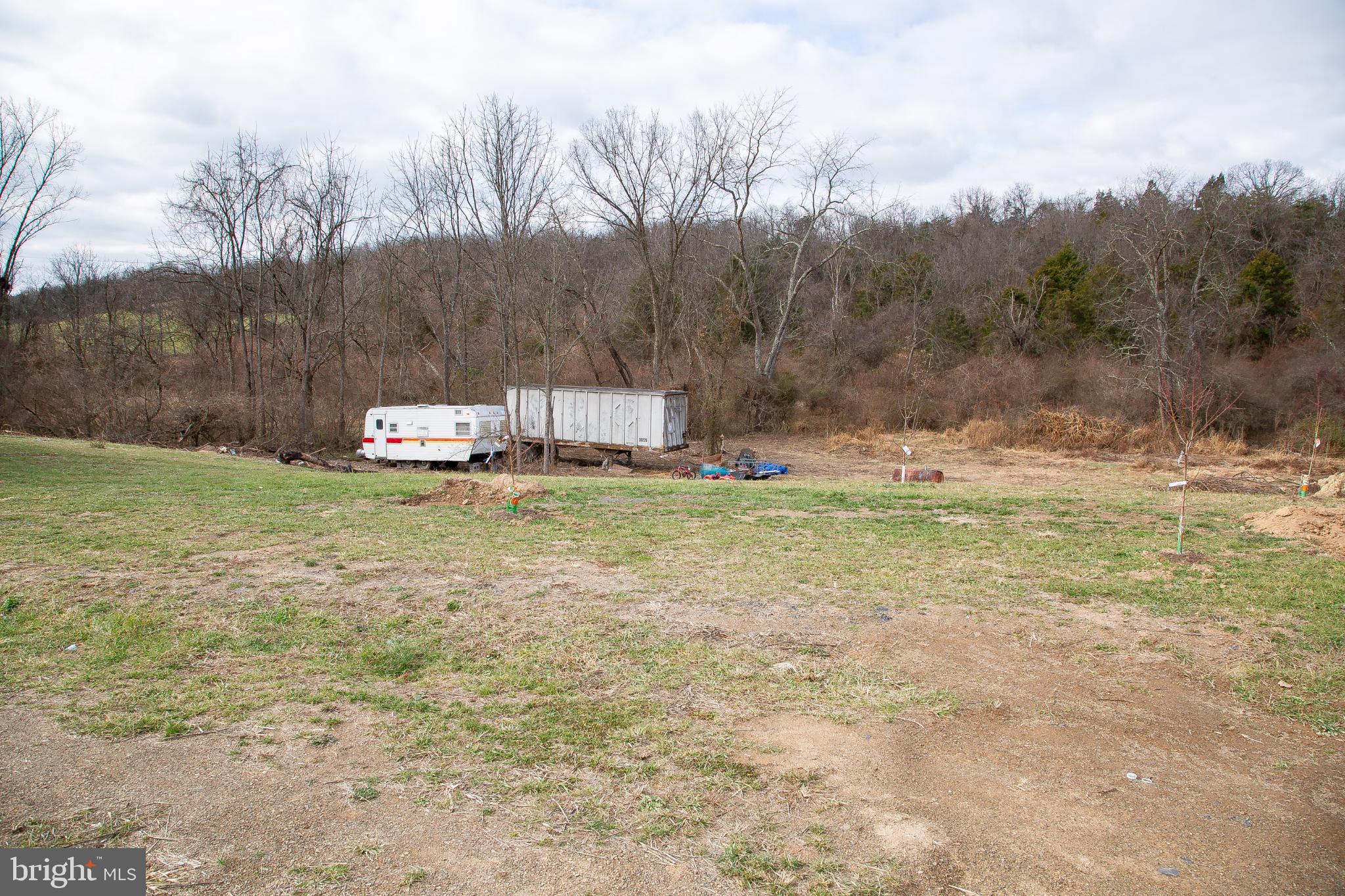 1101 Beaver Run Road Burlington, WV 26710 - Photo 39 of 40 a swimming pool with trees in the background