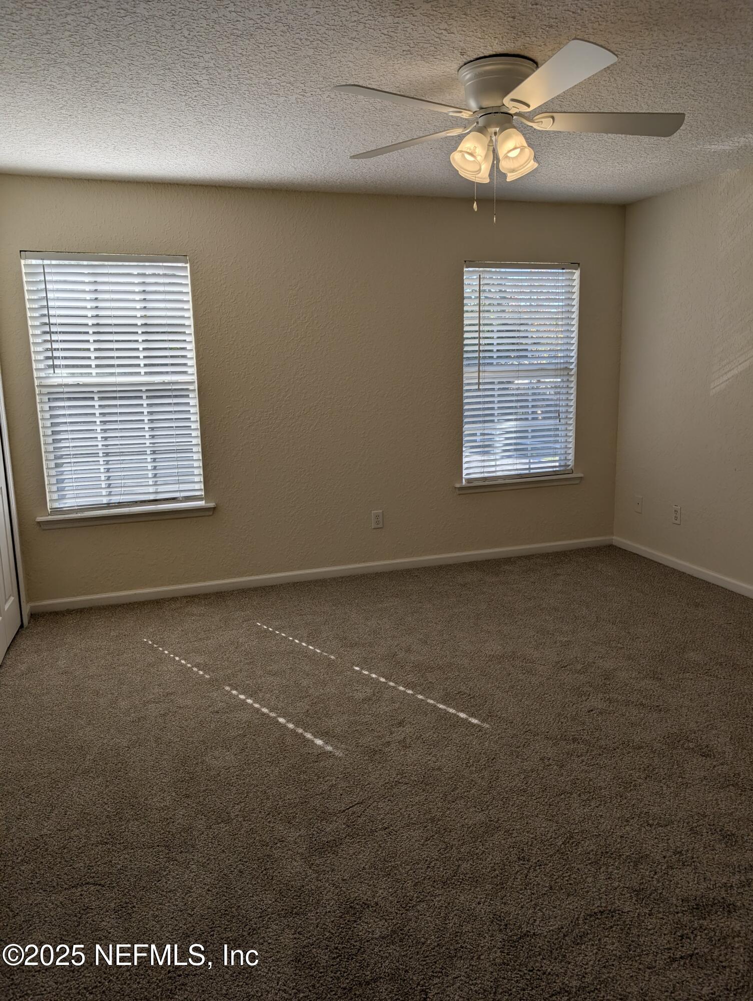 1811 Lago Del Sur Drive Middleburg, FL 32068 - Photo 6 of 10 an empty room with a window