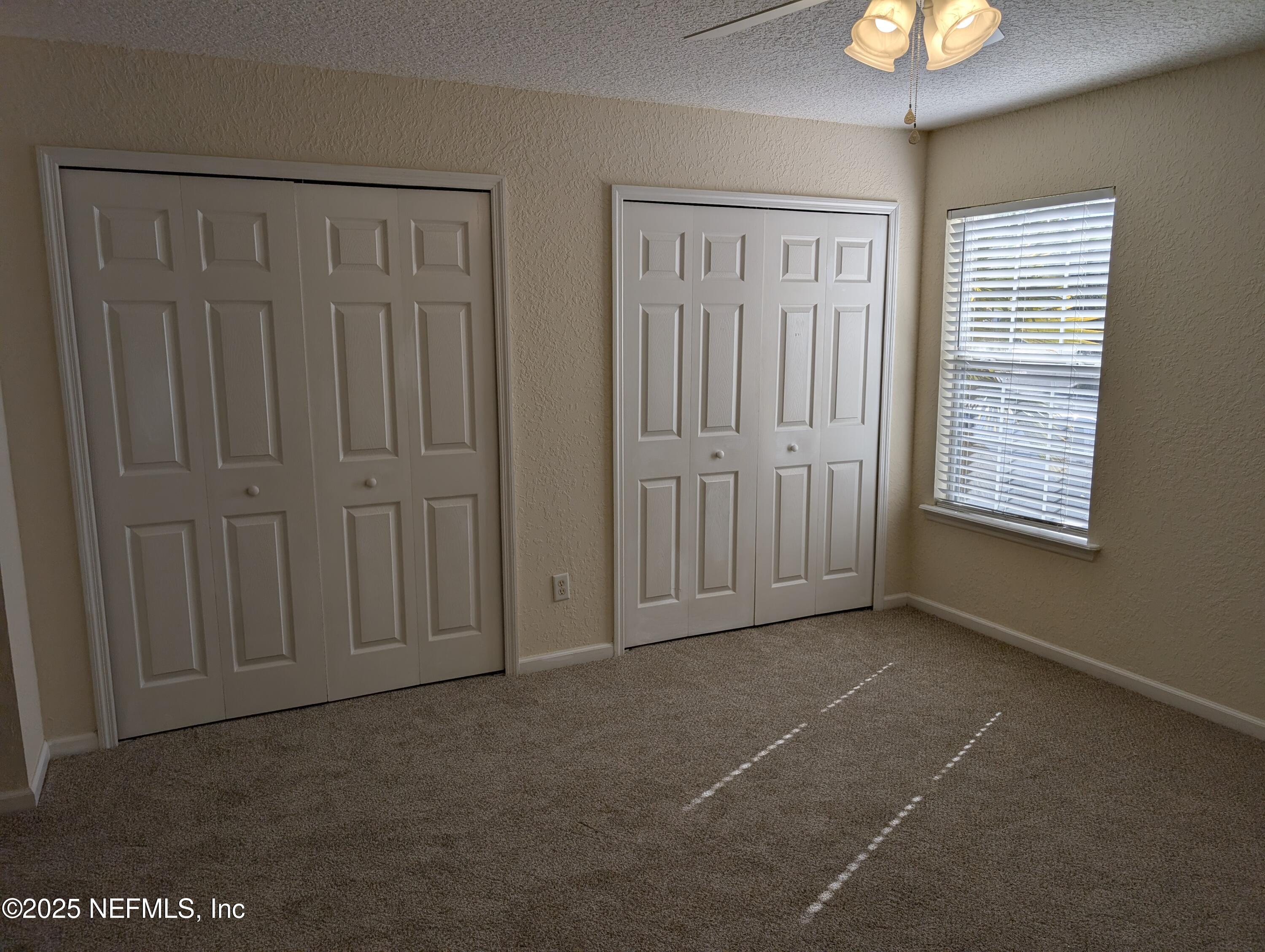 1811 Lago Del Sur Drive Middleburg, FL 32068 - Photo 7 of 10 a view of an empty room with a window