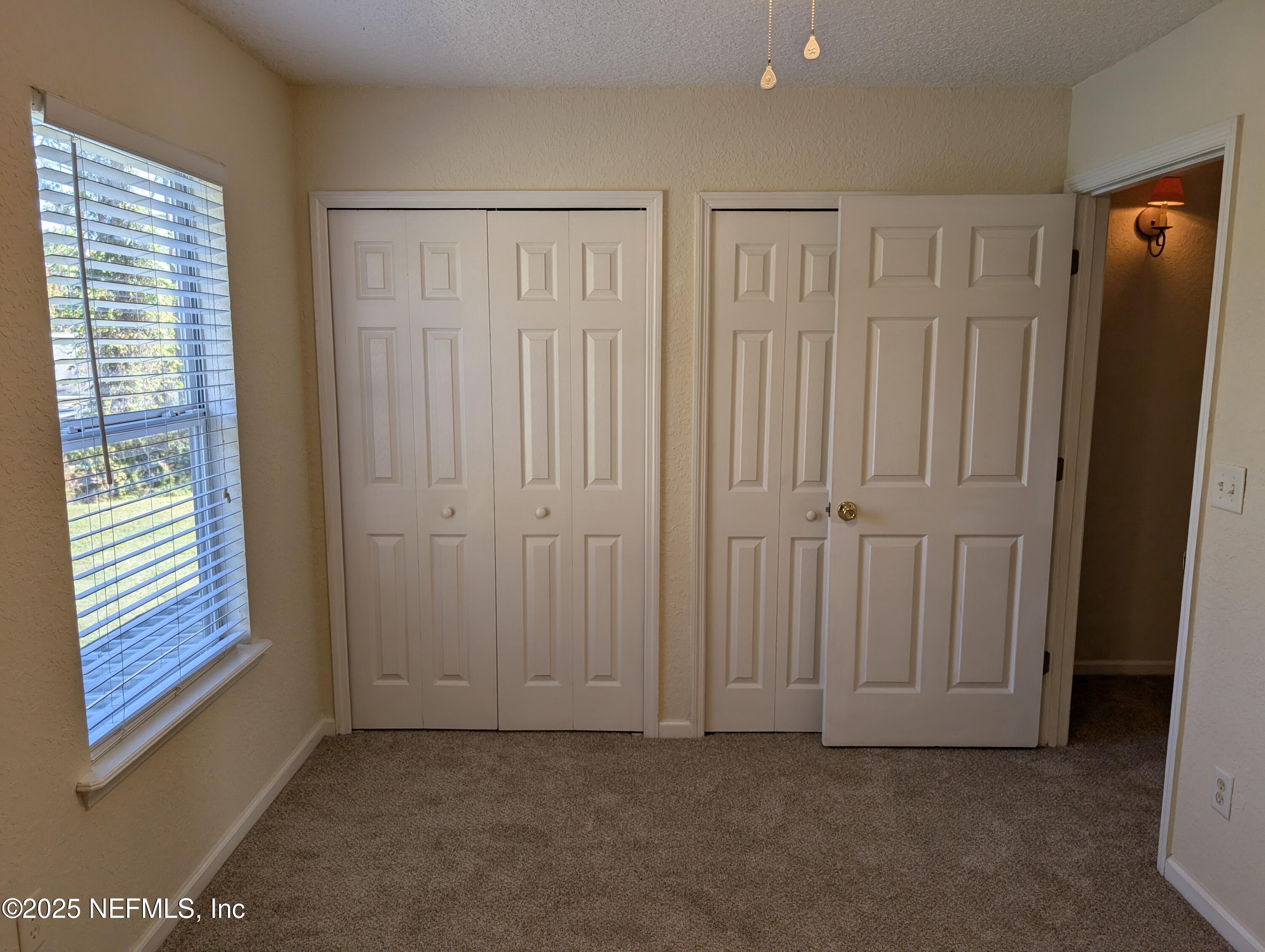 1811 Lago Del Sur Drive Middleburg, FL 32068 - Photo 9 of 10 an empty room with windows