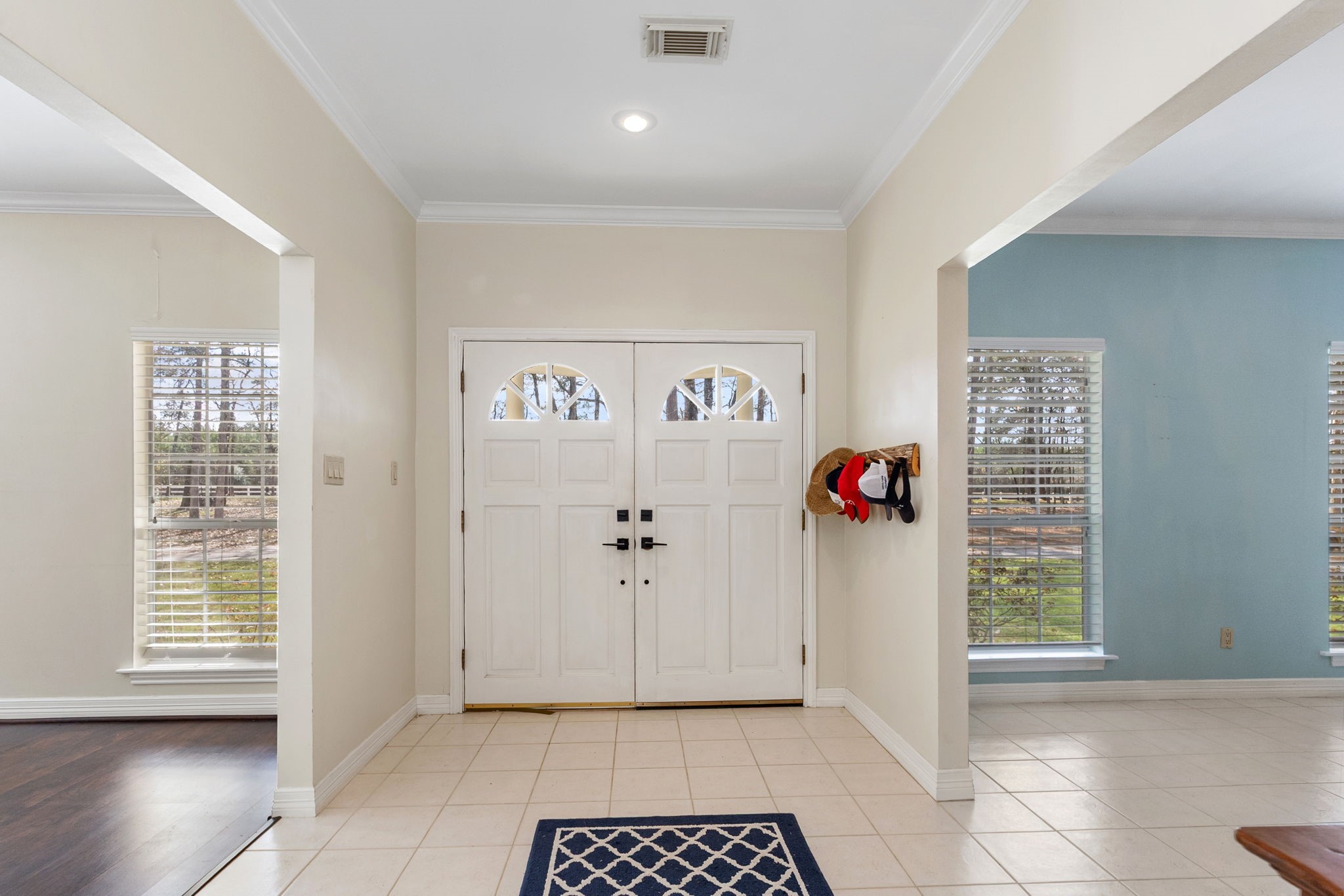 9139 Highway 94 Groveton, TX 75845 - Photo 13 of 49 a view of an entryway with wooden floor and a window