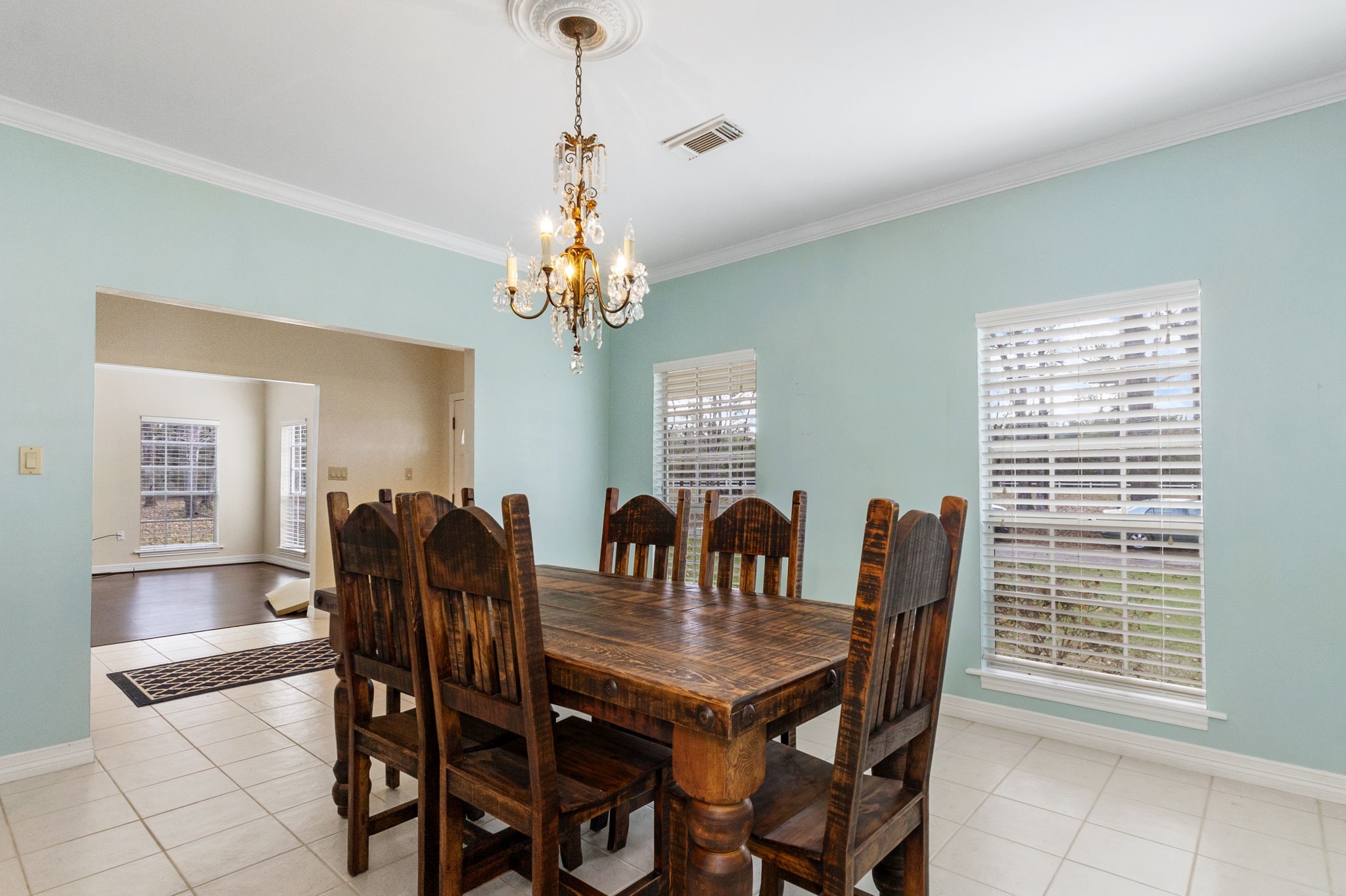 9139 Highway 94 Groveton, TX 75845 - Photo 16 of 49 a view of a dining room with furniture and chandelier