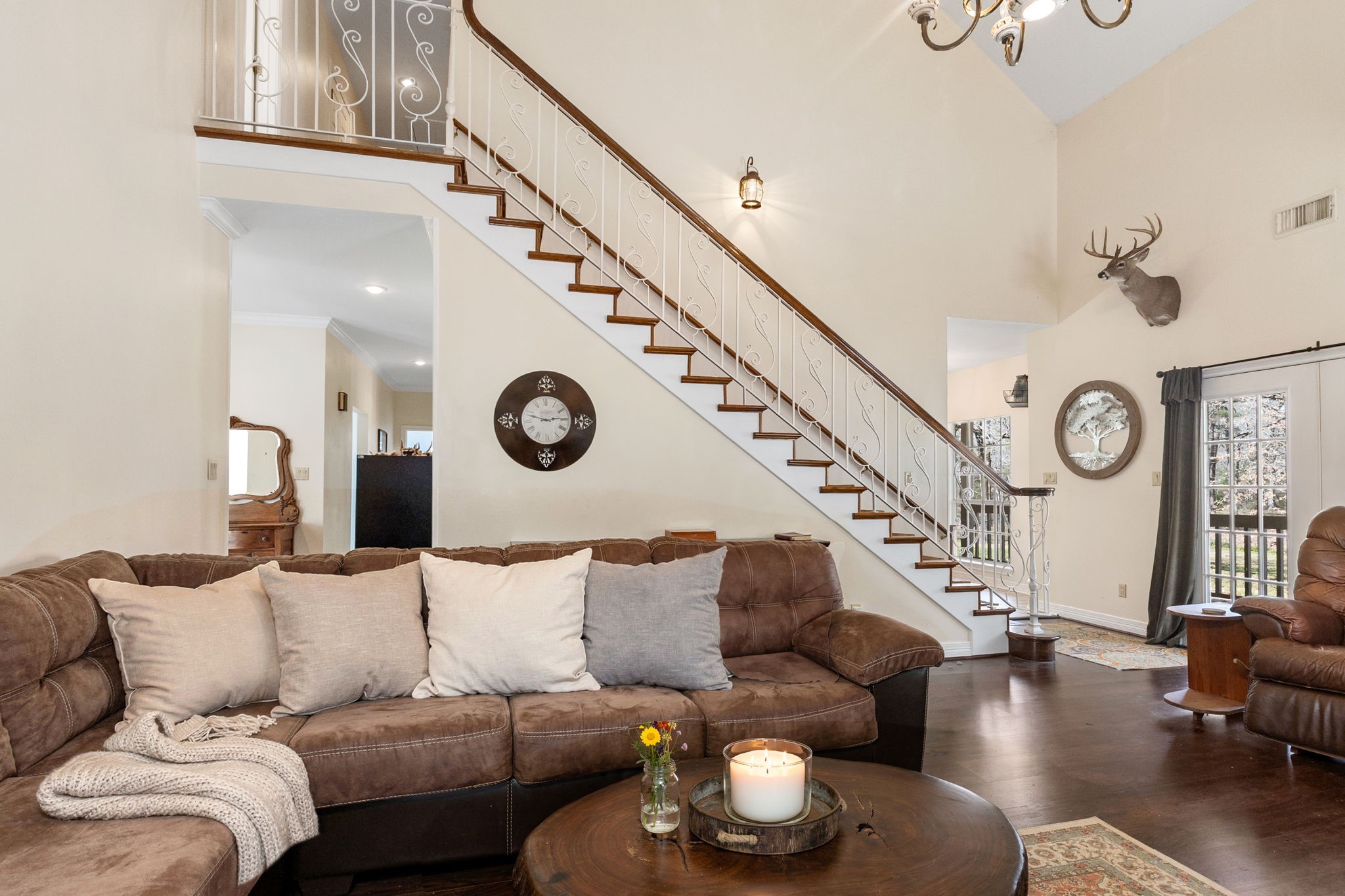 9139 Highway 94 Groveton, TX 75845 - Photo 20 of 49 a living room with furniture and a clock