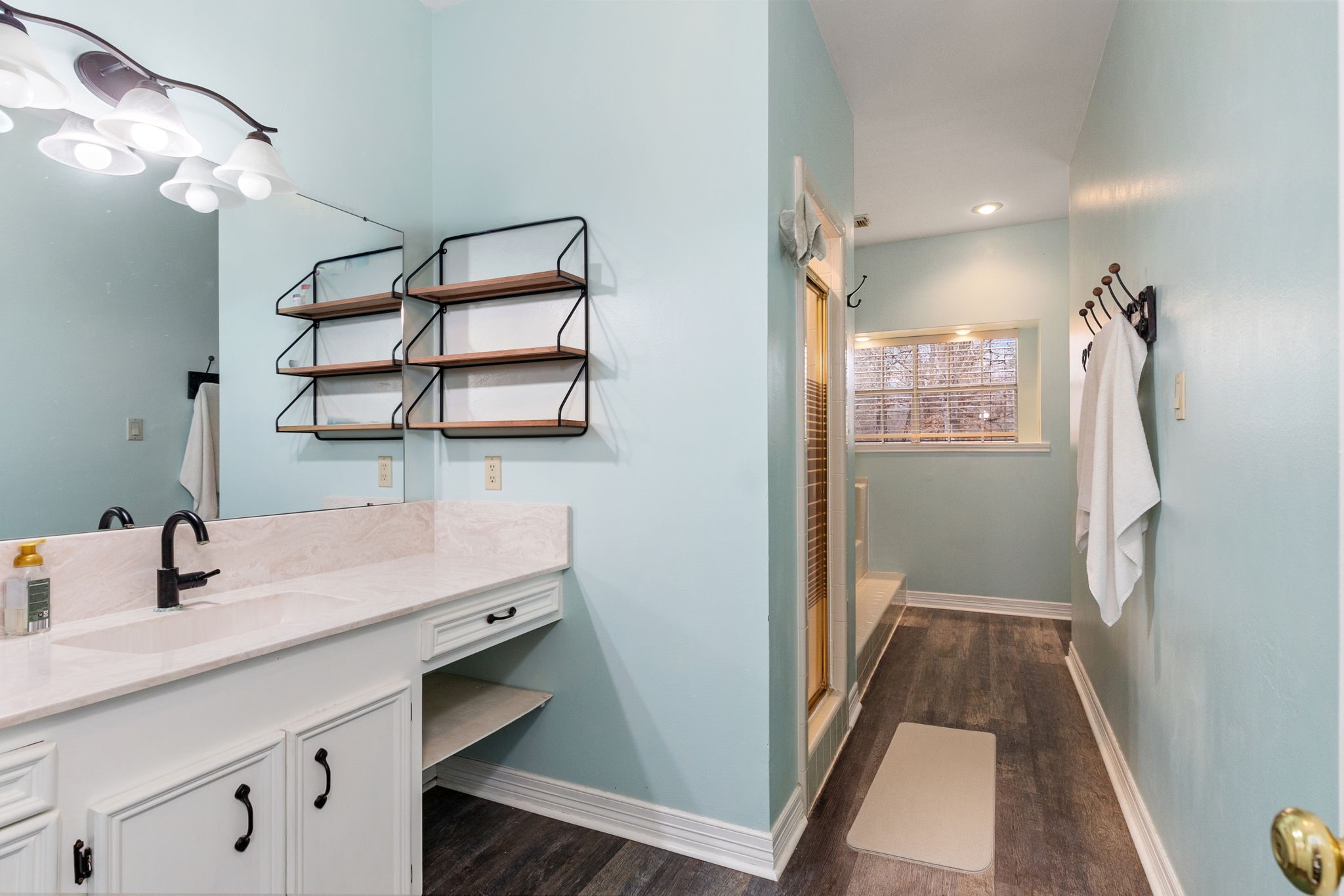 9139 Highway 94 Groveton, TX 75845 - Photo 30 of 49 a bathroom with a sink and mirror