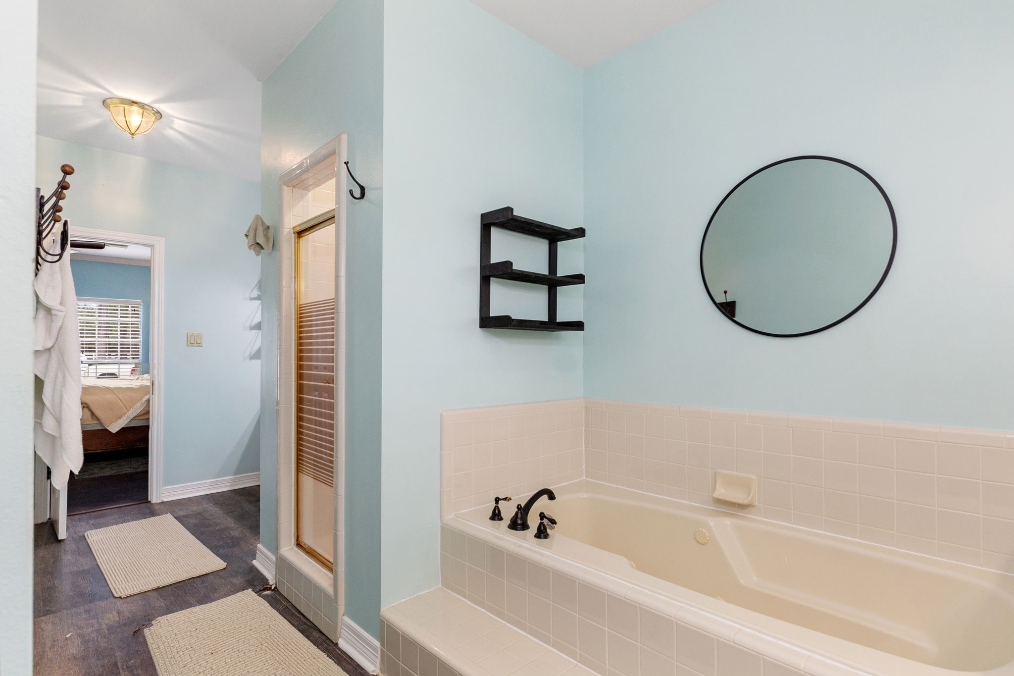 9139 Highway 94 Groveton, TX 75845 - Photo 31 of 49 a bathroom with a bathtub and a shower