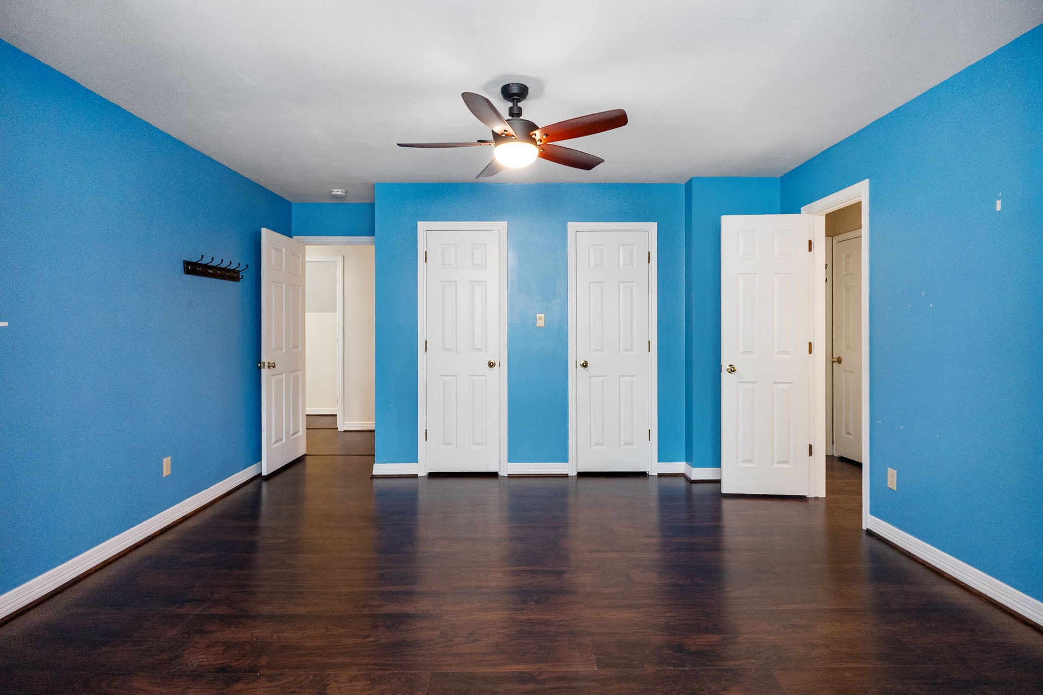 9139 Highway 94 Groveton, TX 75845 - Photo 37 of 49 a view of room with hardwood floor and ceiling fan