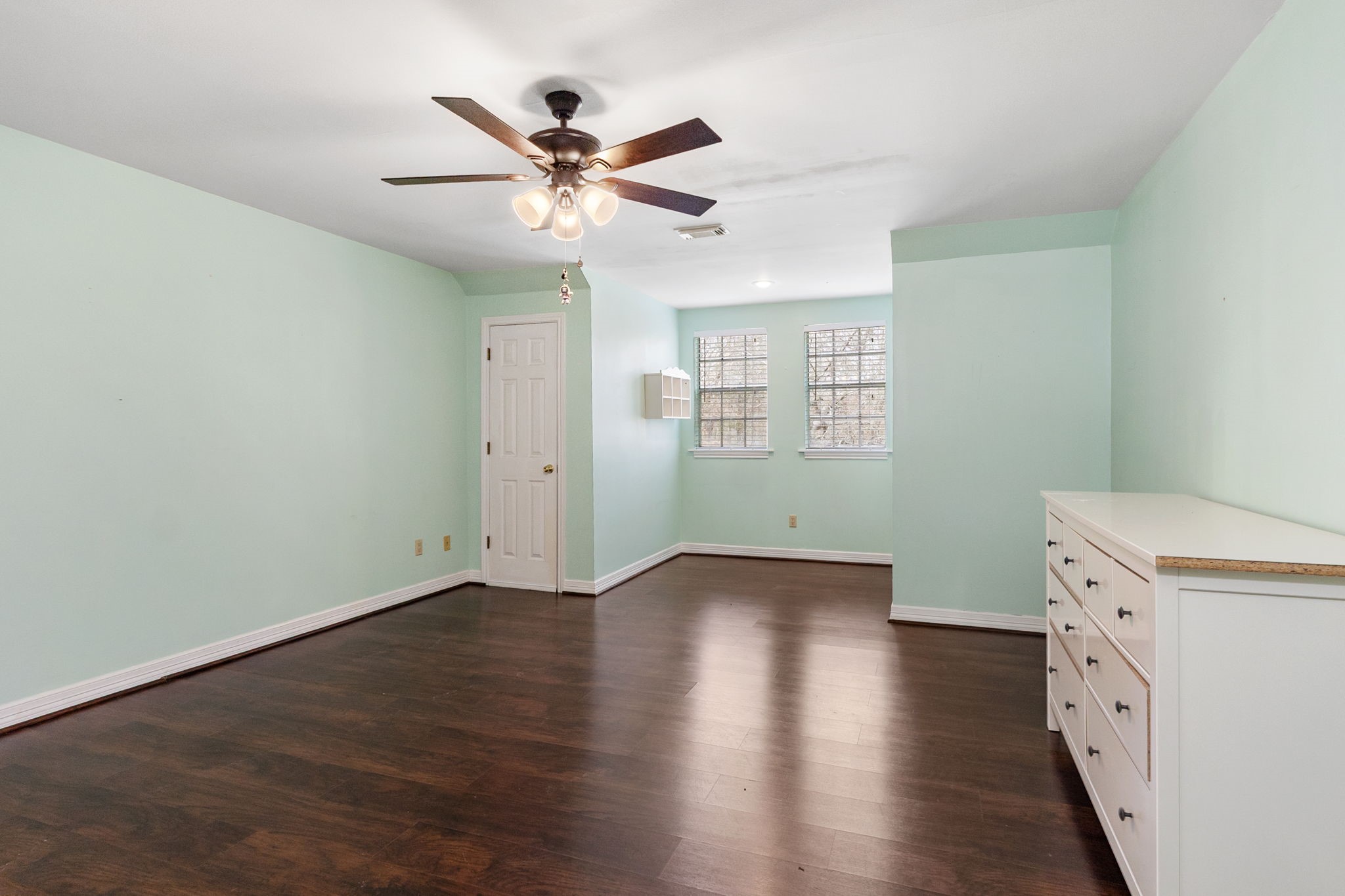 9139 Highway 94 Groveton, TX 75845 - Photo 39 of 49 wooden floor in an empty room with a window