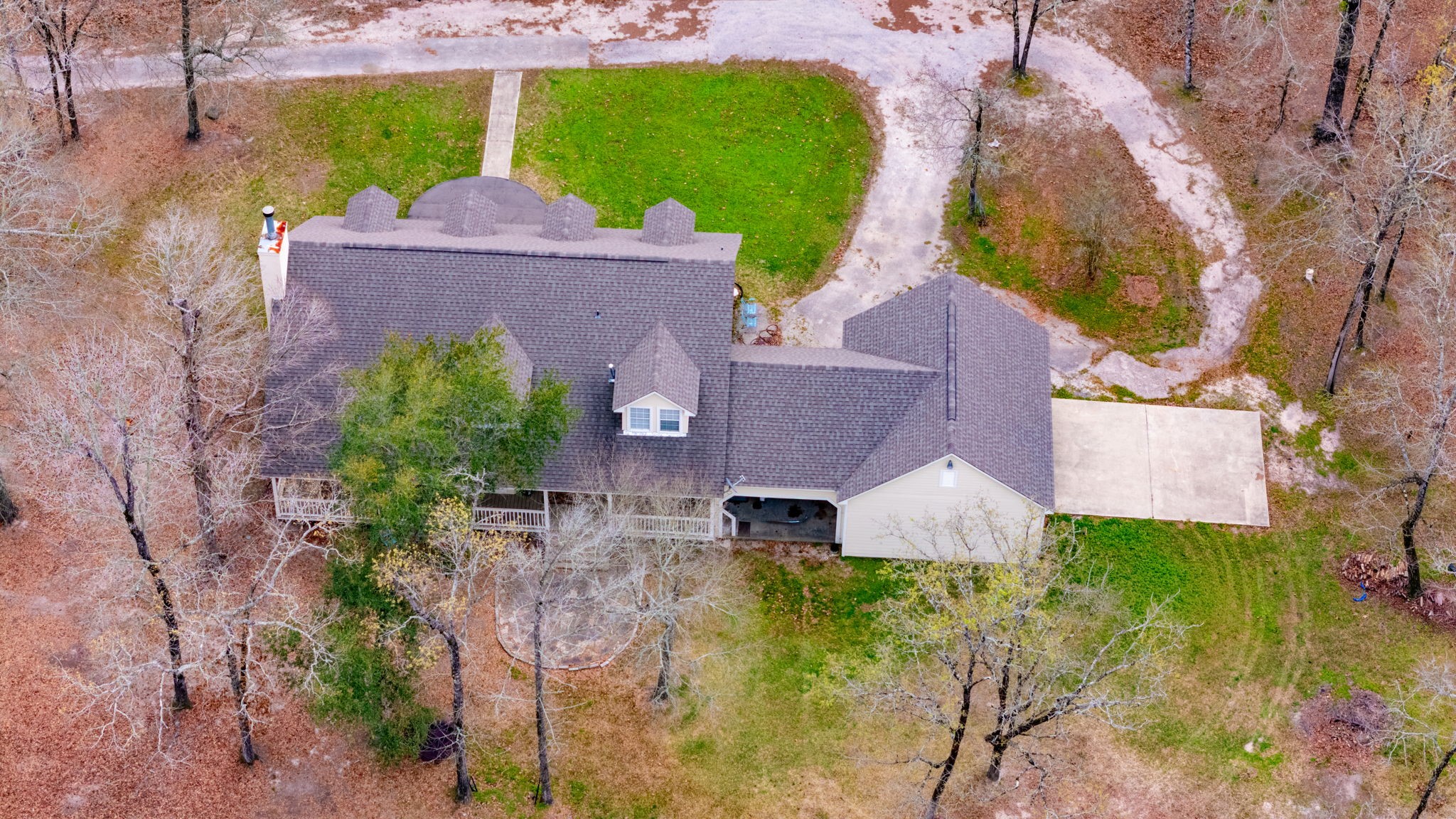 9139 Highway 94 Groveton, TX 75845 - Photo 5 of 49 an aerial view of a house with a garden and a yard