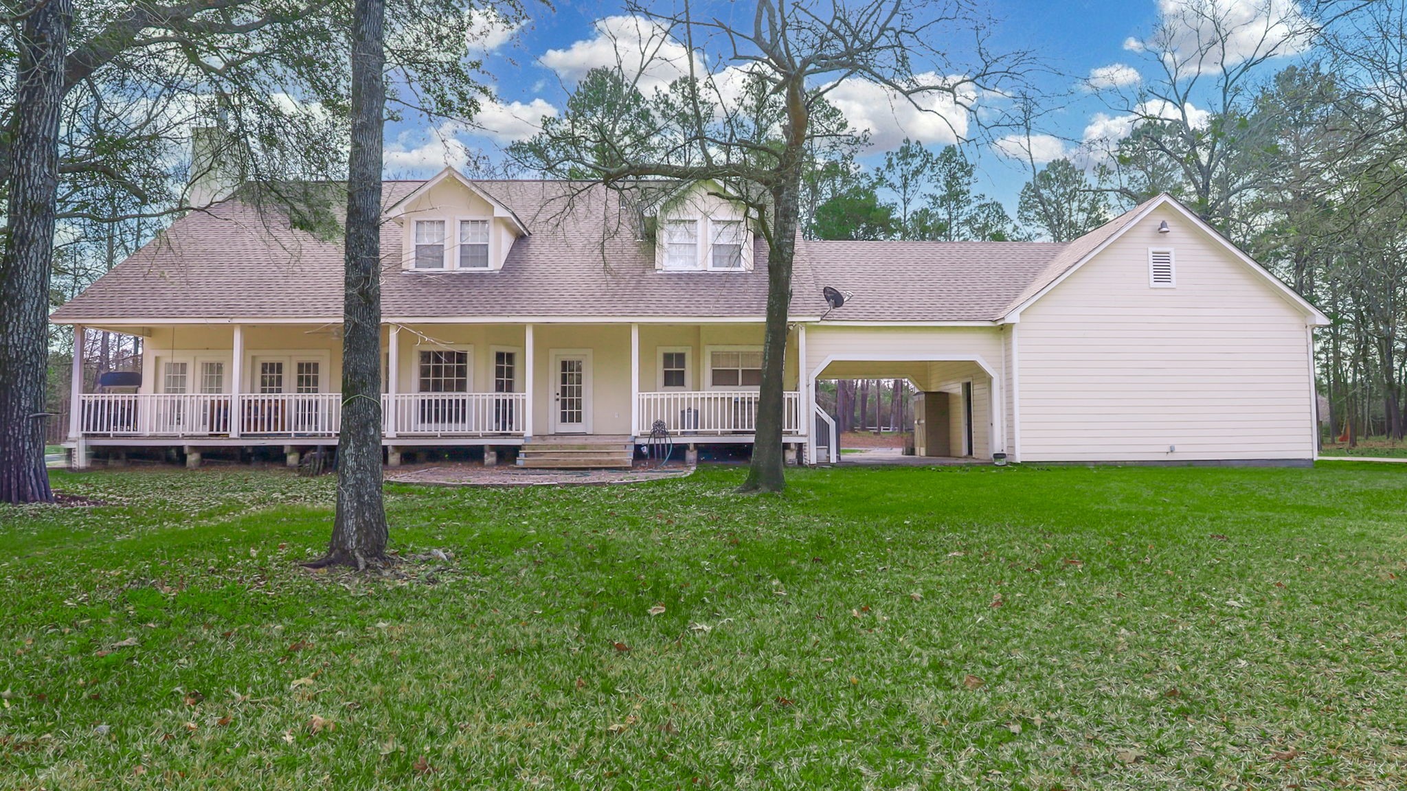 9139 Highway 94 Groveton, TX 75845 - Photo 7 of 49 a view of a house with a yard potted plants and large tree