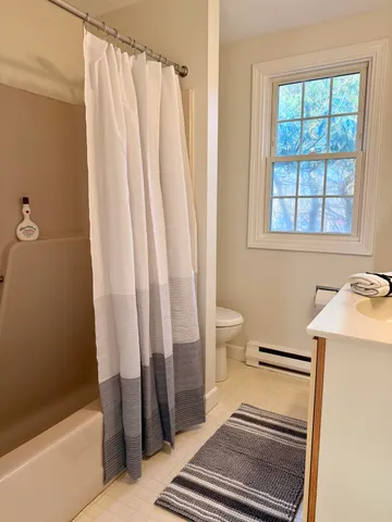 a bathroom with a sink and a bathtub