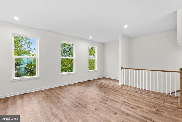 an empty room with windows