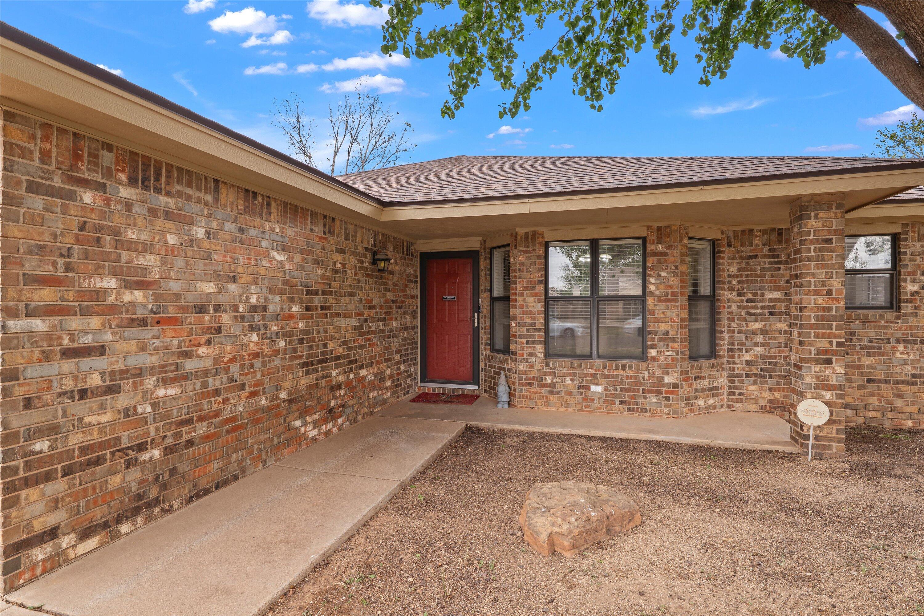 2308 93rd Street Lubbock, TX 79423 - Photo 4 of 28 a view of entrance