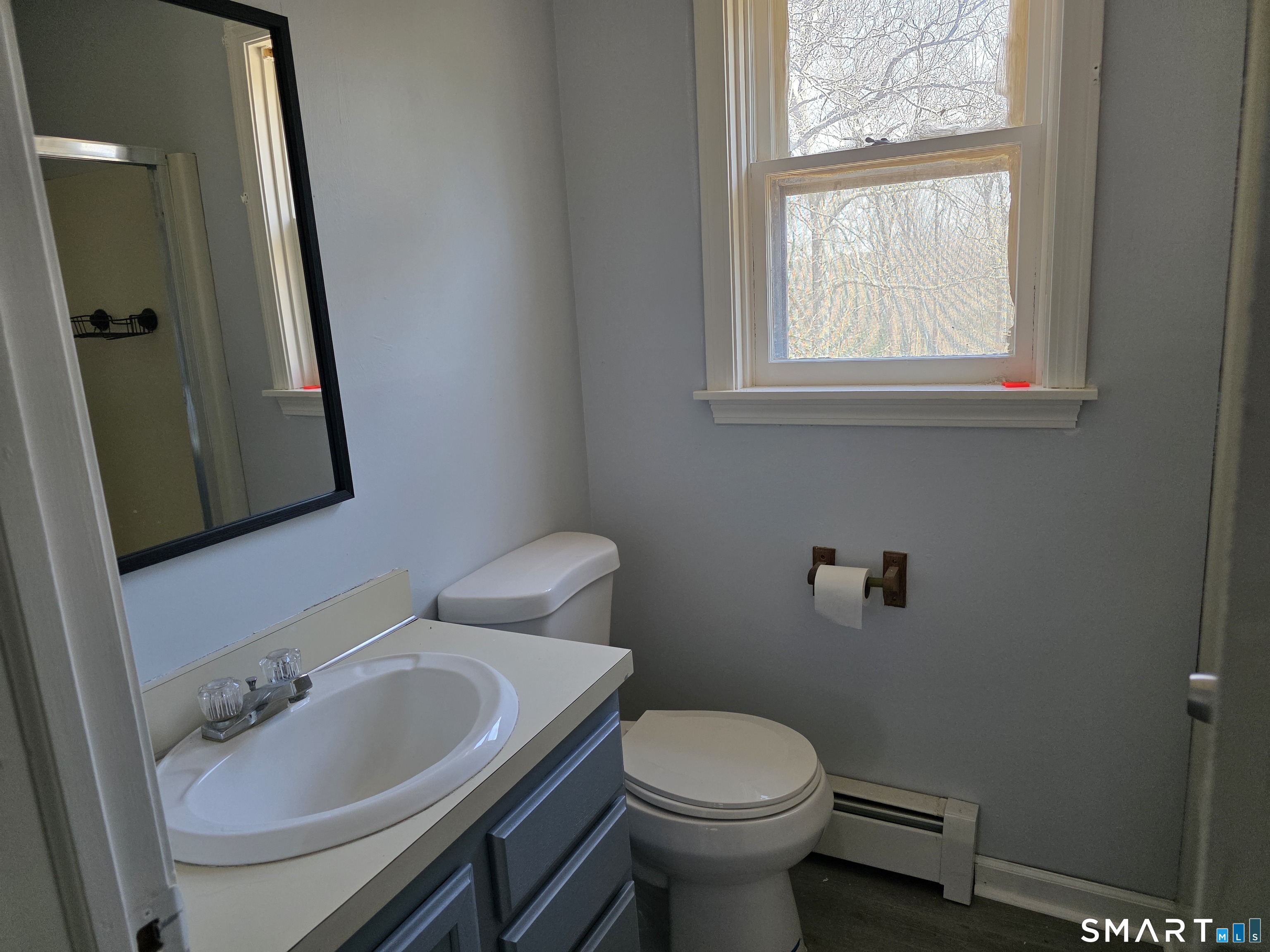 259 Westchester Road, Unit A Colchester, CT 06415 - Photo 19 of 22 a bathroom with a sink and a toilet