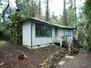 4000 Montecito Avenue Santa Rosa, CA 95404 - Photo 2 of 4 a backyard of a house with wooden floor and outdoor seating