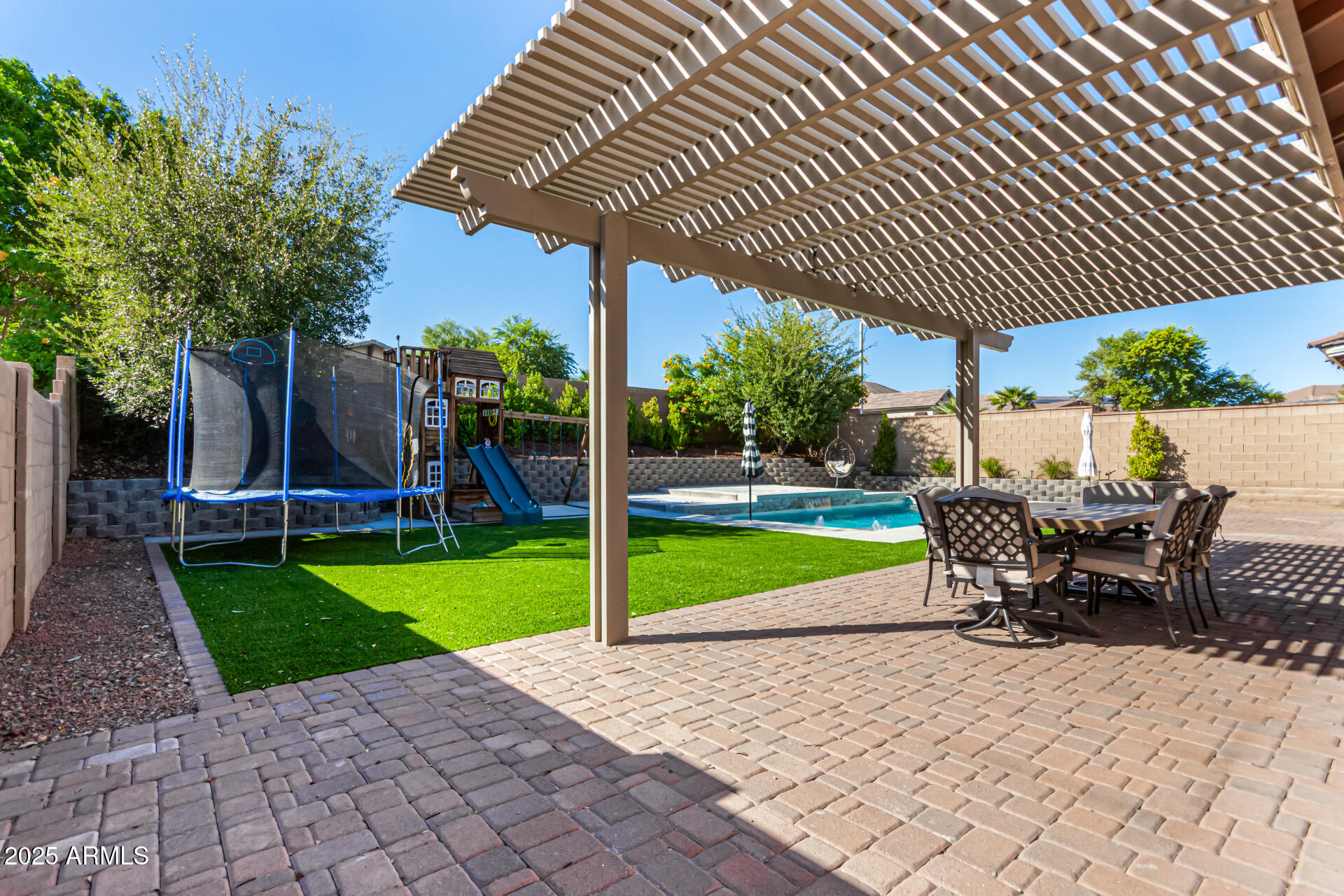 3294 North Springfield Street Buckeye, AZ 85396 - Photo 3 of 43 a view of a table and chairs in the patio