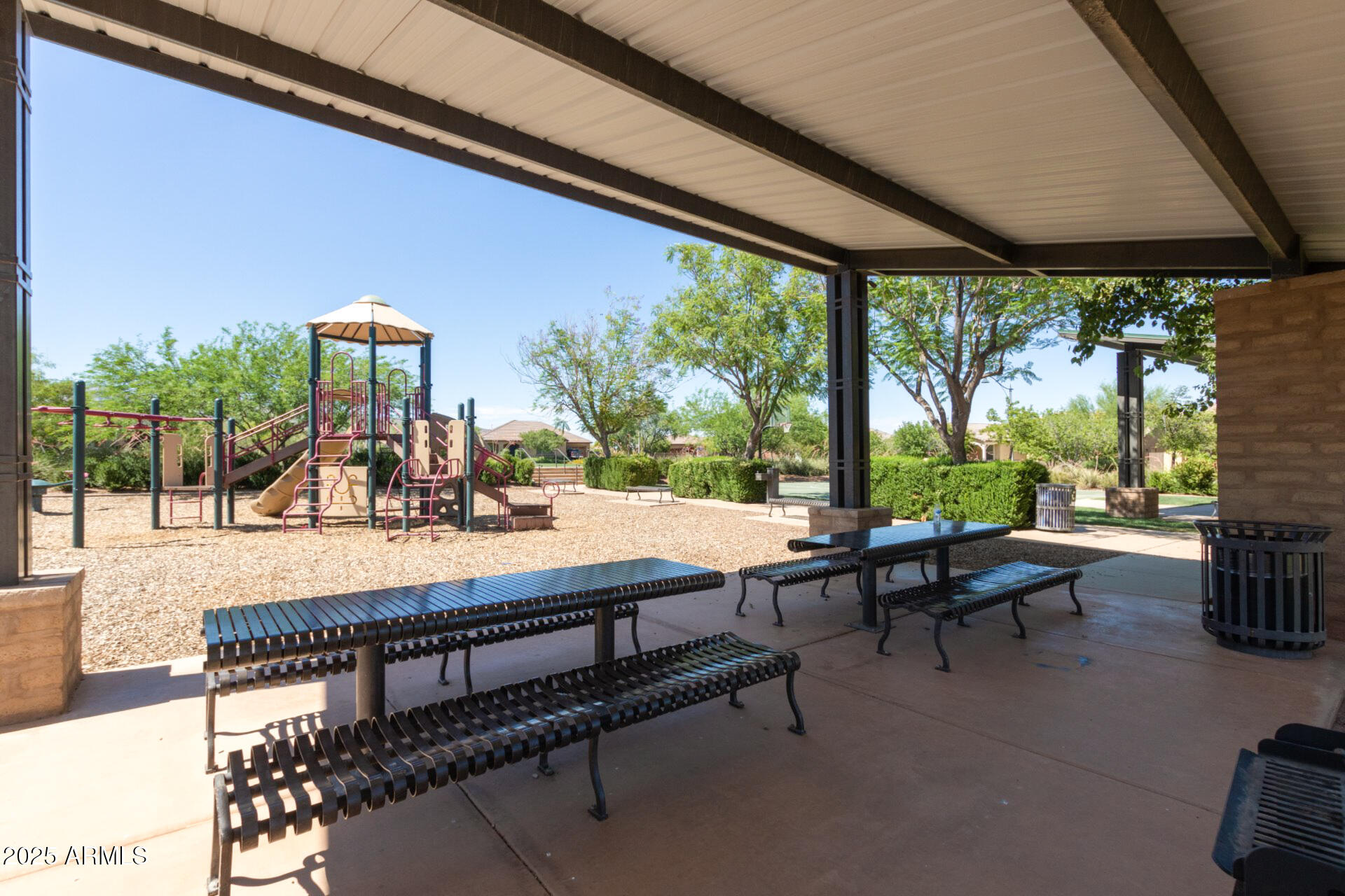 3294 North Springfield Street Buckeye, AZ 85396 - Photo 41 of 43 a living room with patio furniture and a potted plant