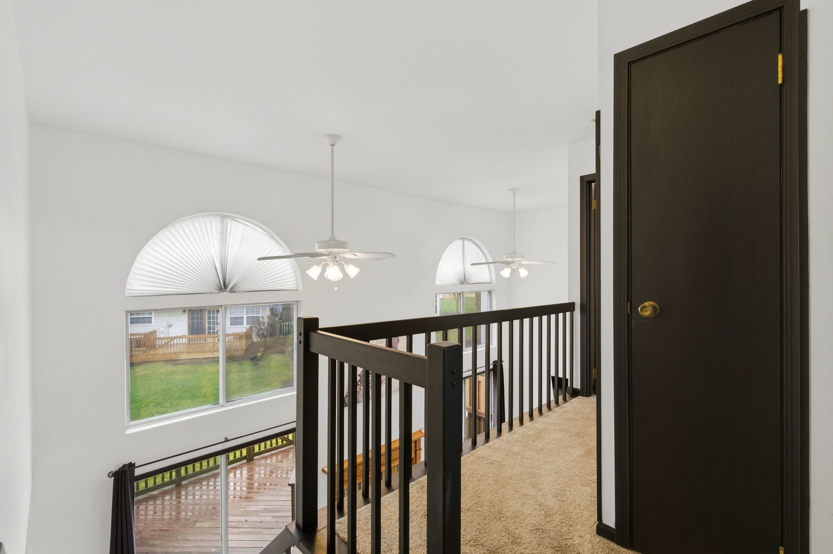 450 Ascot Lane Streamwood, IL 60107 - Photo 17 of 27 a view of a livingroom with a staircase
