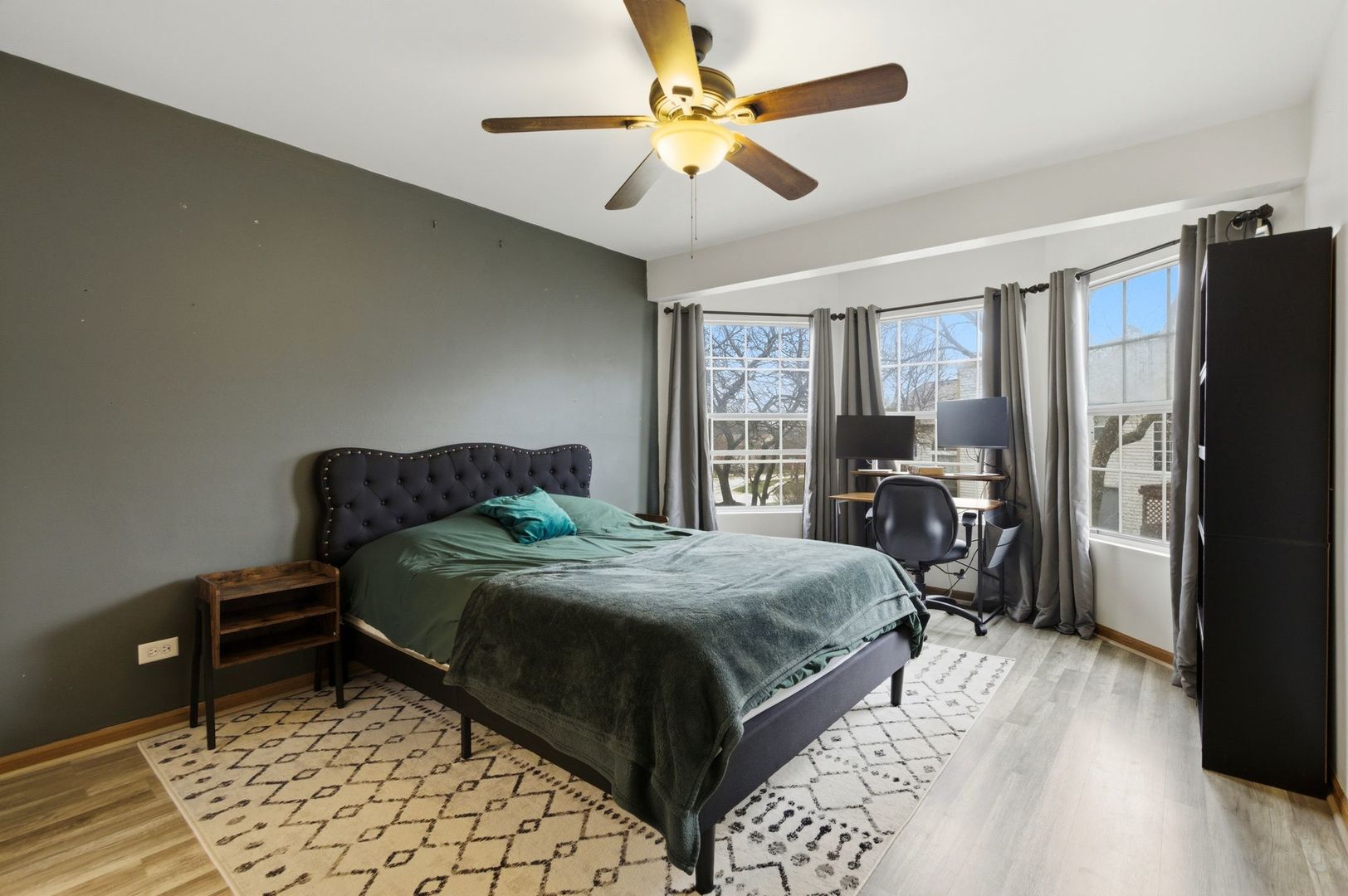 450 Ascot Lane Streamwood, IL 60107 - Photo 19 of 27 a bedroom with a bed dresser and a window