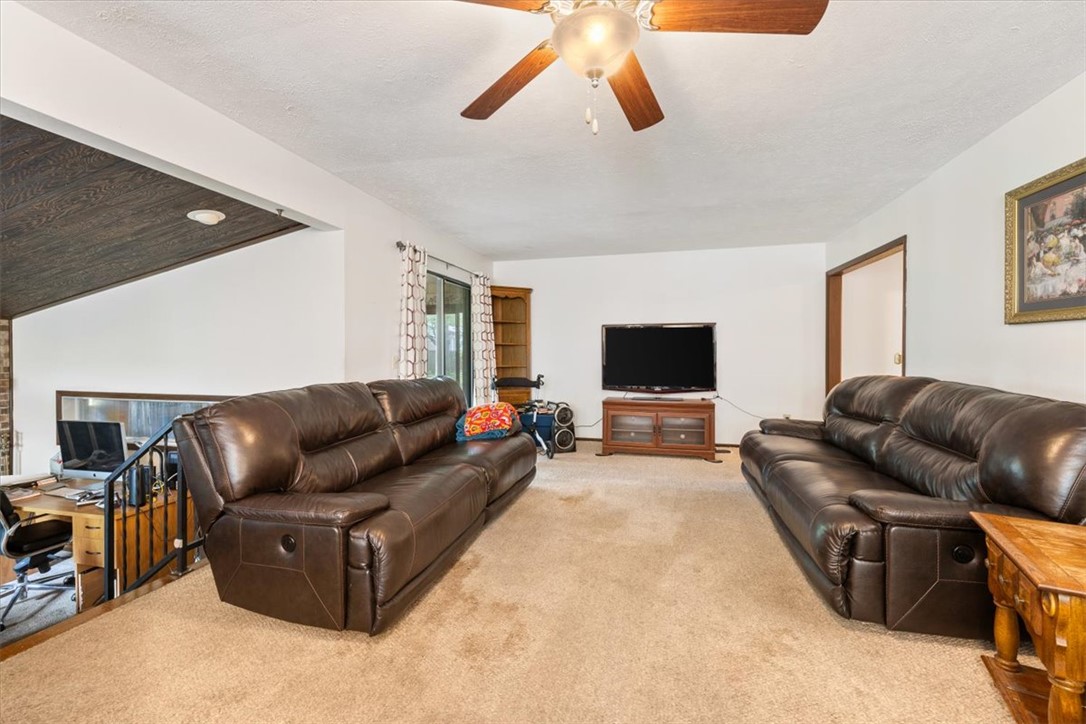 7225 Garber Road Clayton, OH 45415 - Photo 20 of 33 This inviting living room offers comfortable living and ample natural light.