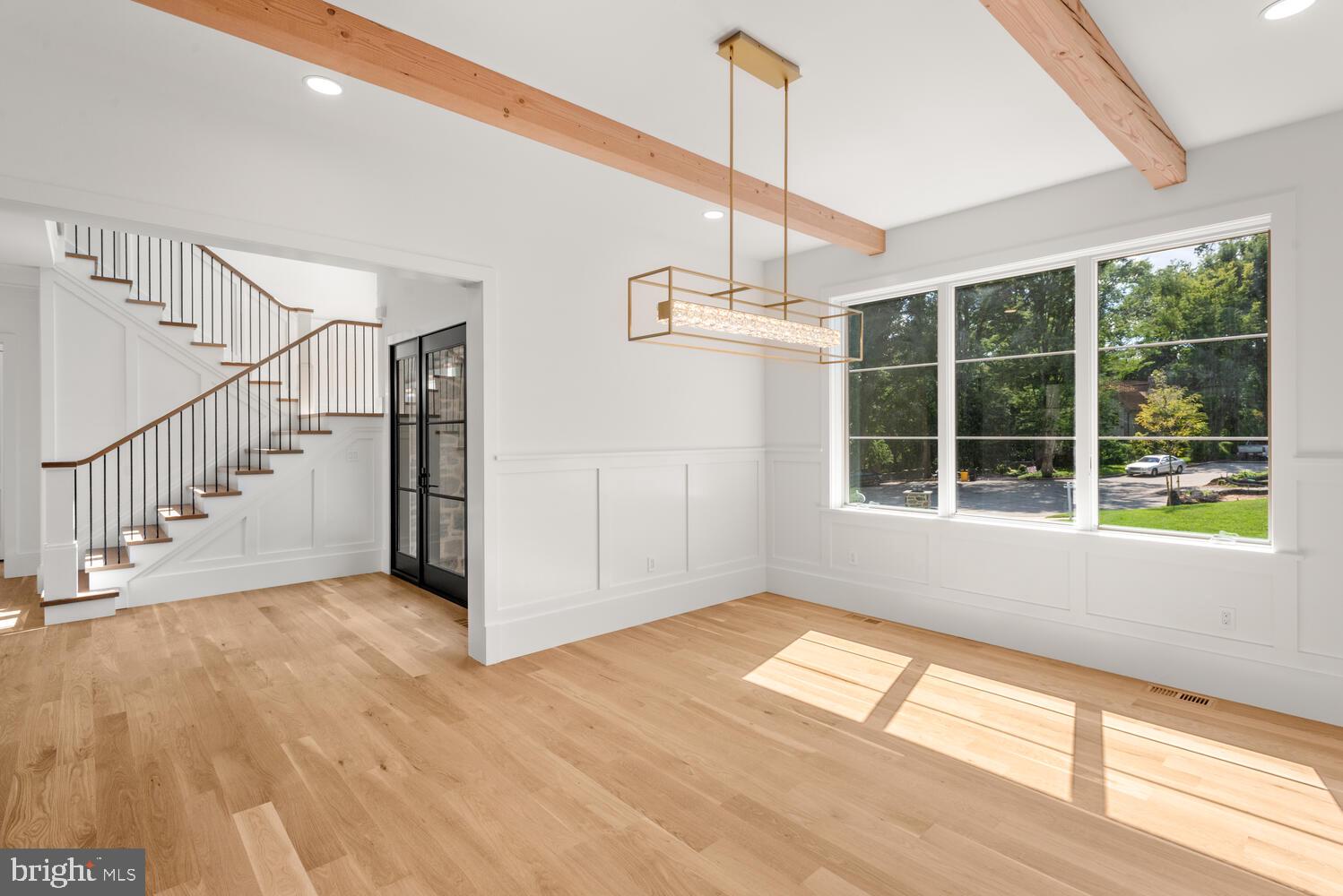 29 Sandringham Road Bala Cynwyd, PA 19004 - Photo 11 of 29 a view of empty room with wooden floor and fan