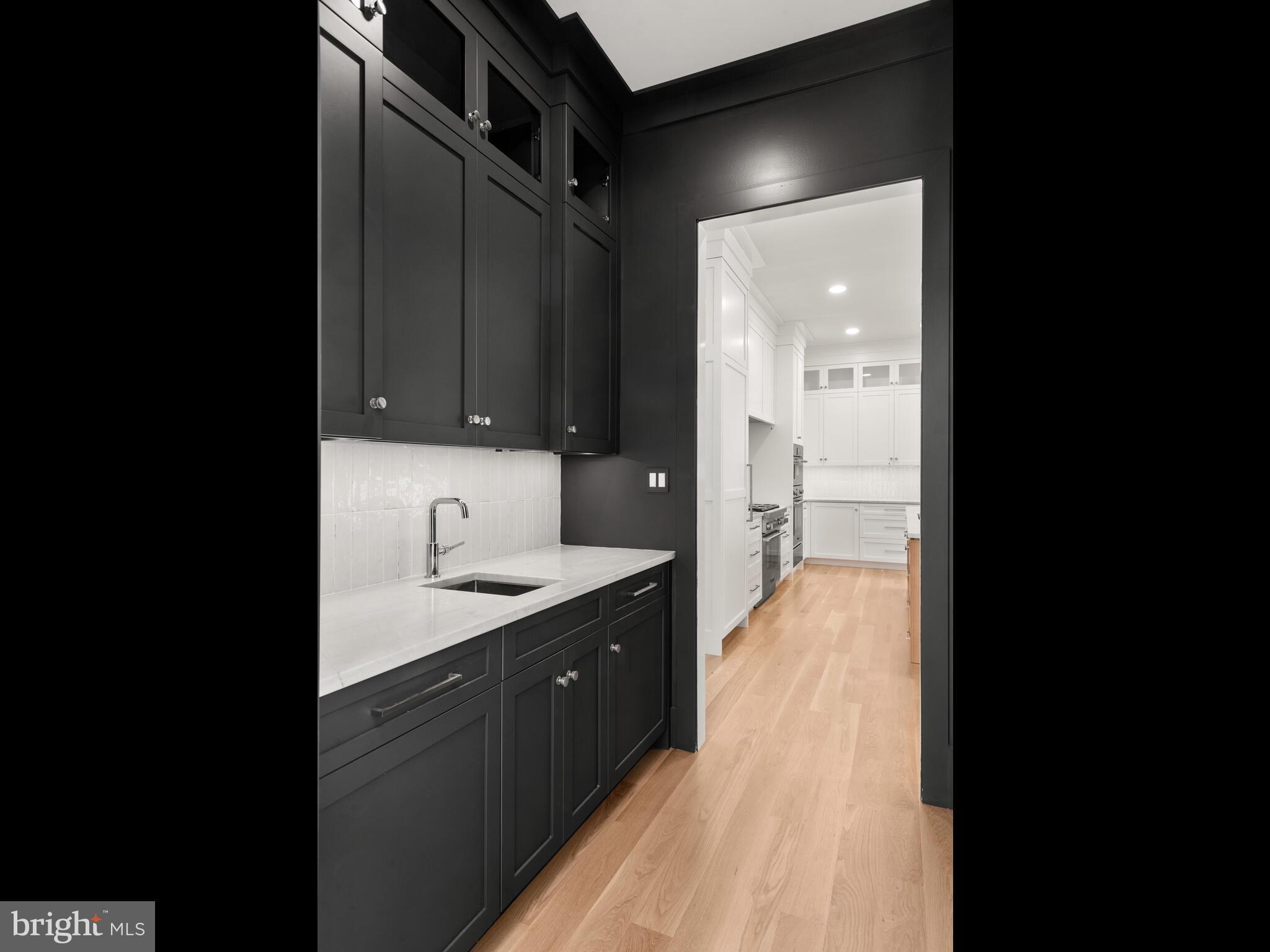 29 Sandringham Road Bala Cynwyd, PA 19004 - Photo 14 of 29 a en suite bathroom with a sink and mirror