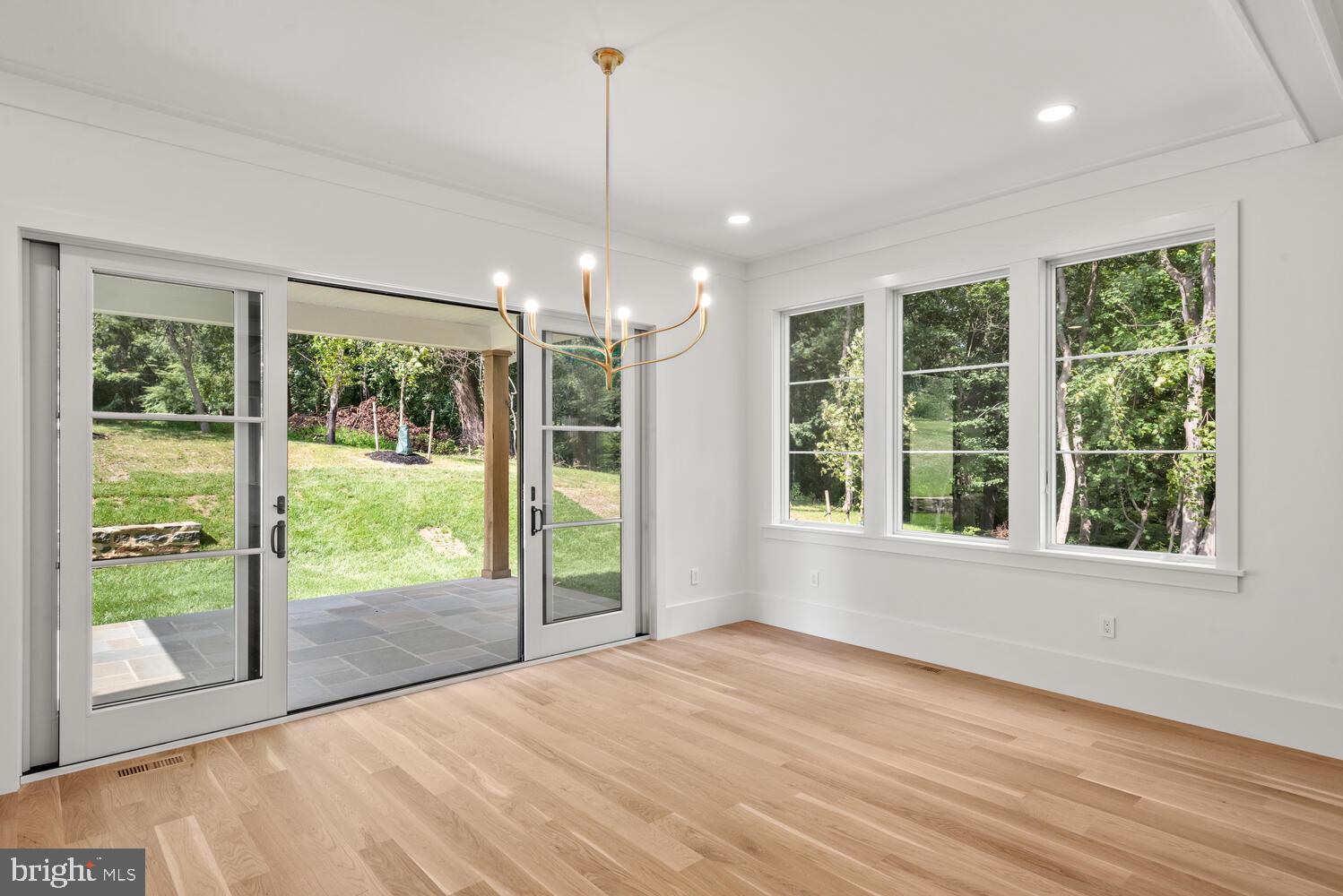 29 Sandringham Road Bala Cynwyd, PA 19004 - Photo 15 of 29 a view of an empty room with wooden floor and a window