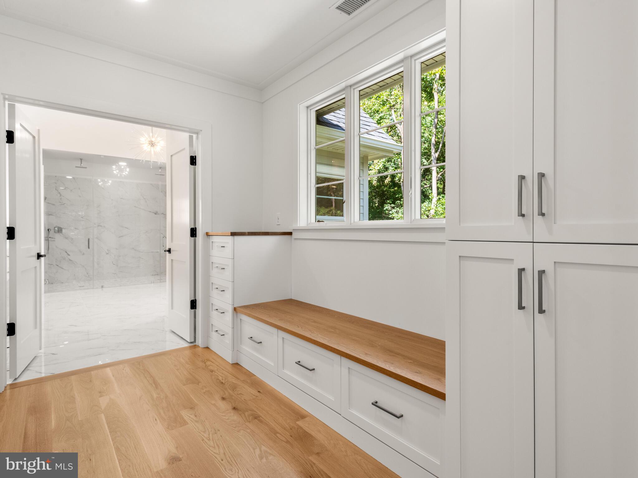 29 Sandringham Road Bala Cynwyd, PA 19004 - Photo 19 of 29 a bathroom with a bathtub and a shower