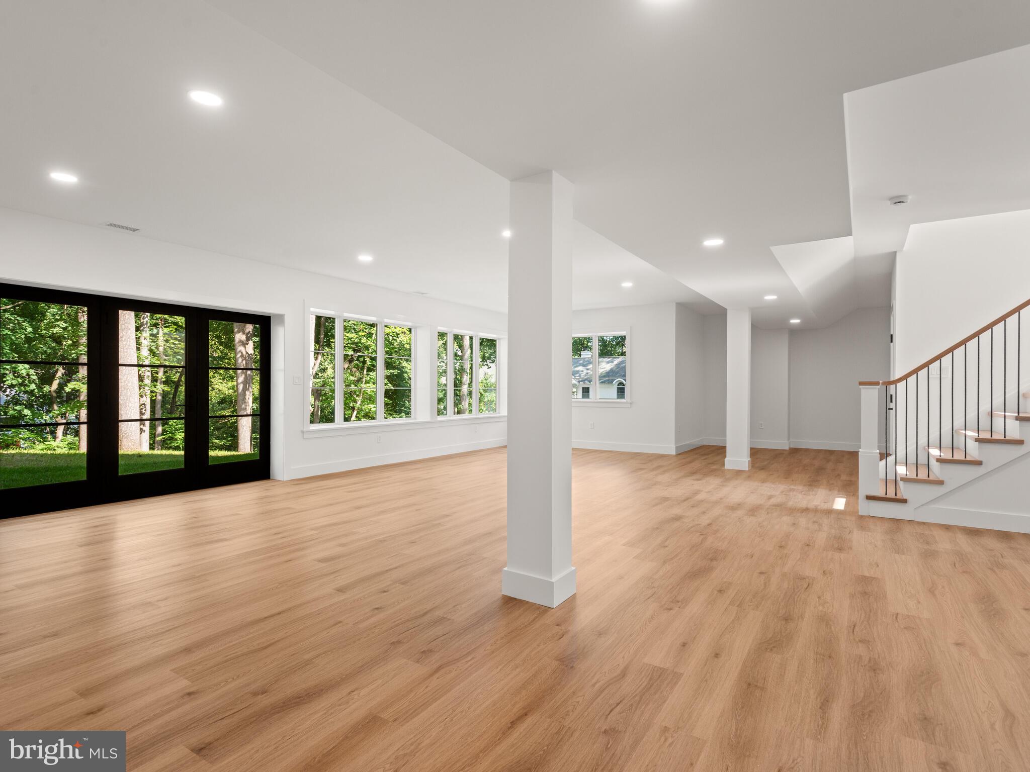 29 Sandringham Road Bala Cynwyd, PA 19004 - Photo 23 of 29 a view of an empty room with wooden floor and a window