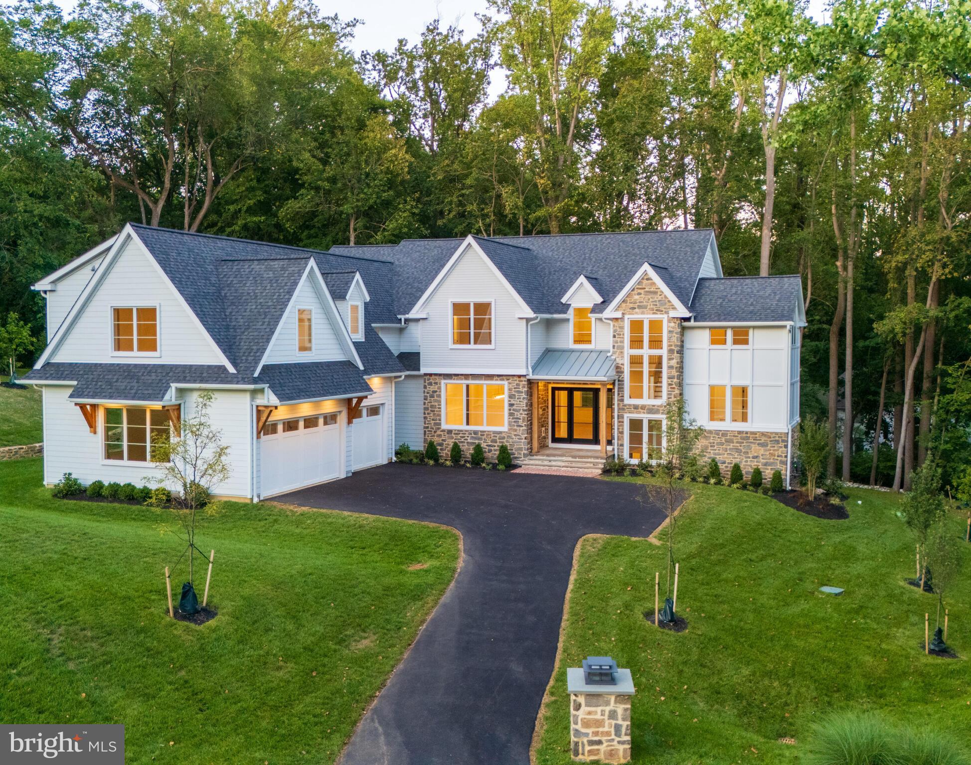 29 Sandringham Road Bala Cynwyd, PA 19004 - Photo 4 of 29 a front view of house with yard and green space