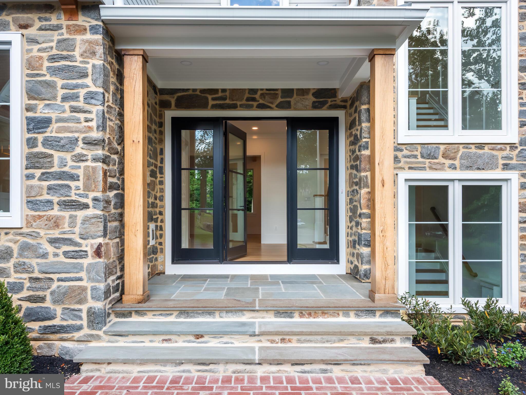29 Sandringham Road Bala Cynwyd, PA 19004 - Photo 7 of 29 a view of a brick building with a door and a window