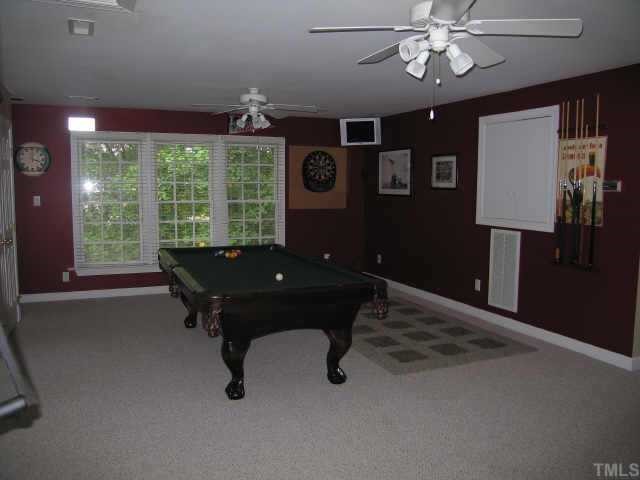 5616 Raddington Street Raleigh, NC 27613 - Photo 9 of 10 a living room with furniture and a large window